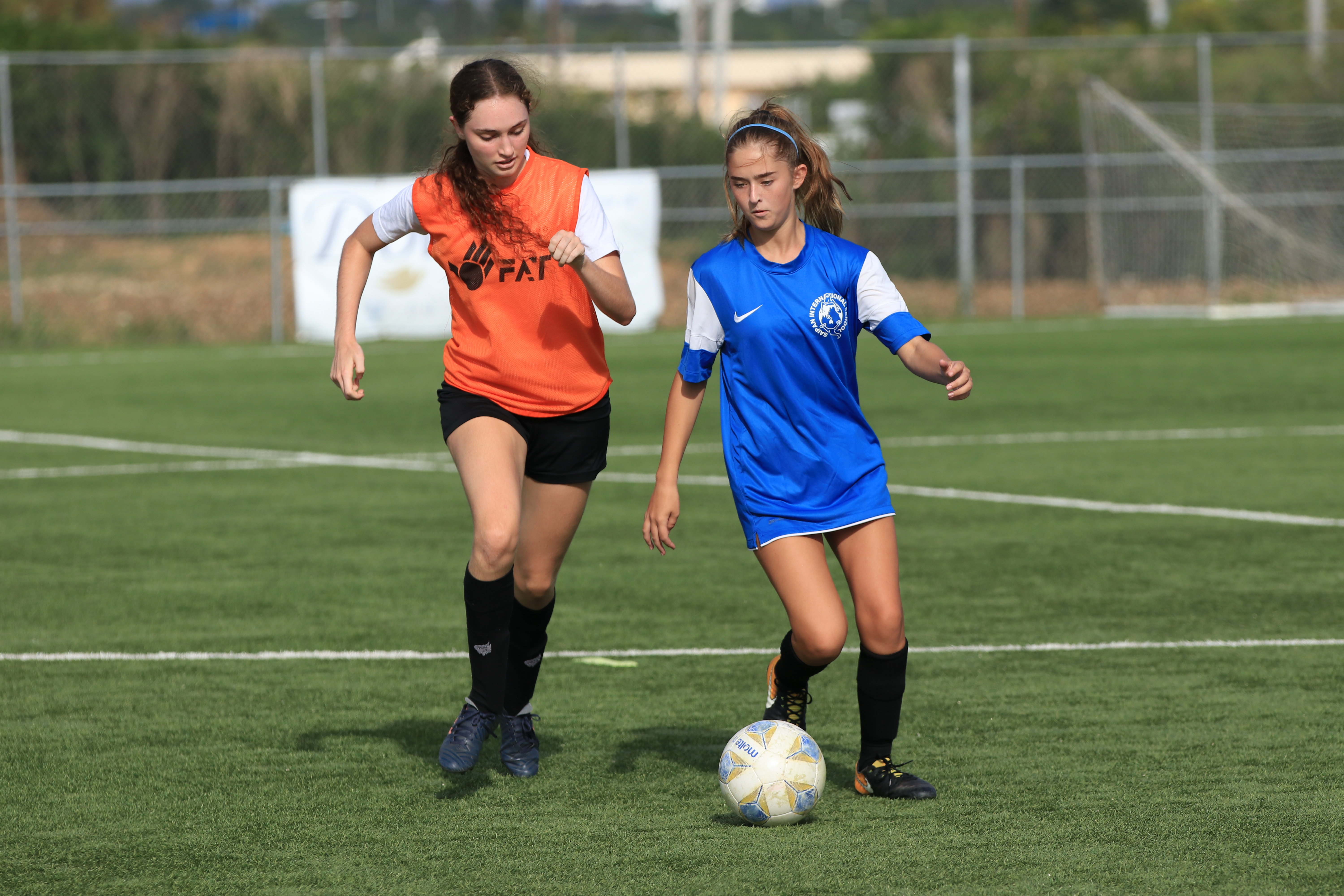 SIS and MCS players battle for the possession during a high school division game of the NMIFA-PSS Interscholastic Soccer League Saturday at the NMI Soccer Training Center.