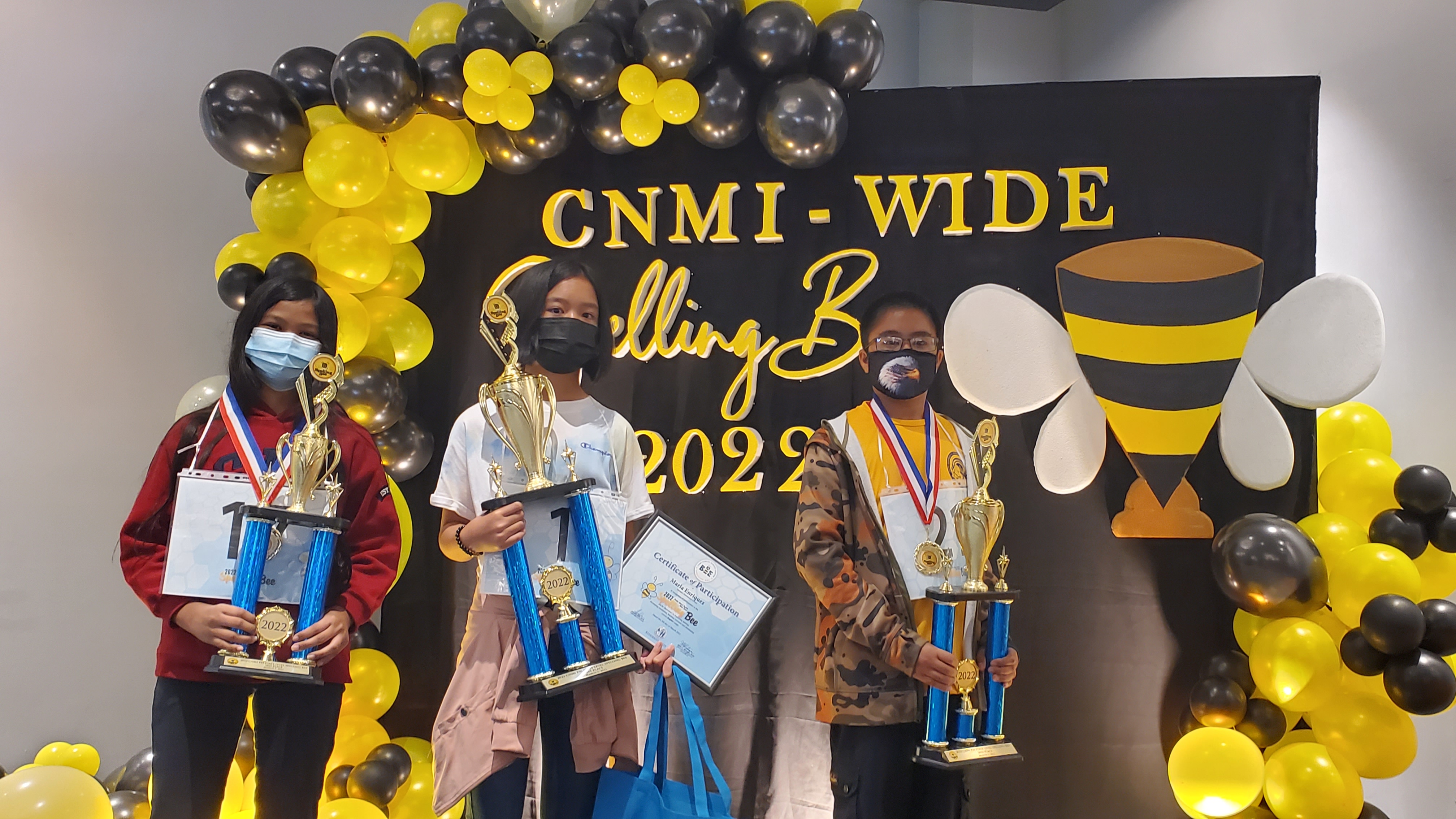 From left: Mary Joy Viloria, 3rd place; Maria Enriquez, 1st place; and Walter Josh N. Clave, 2nd place.