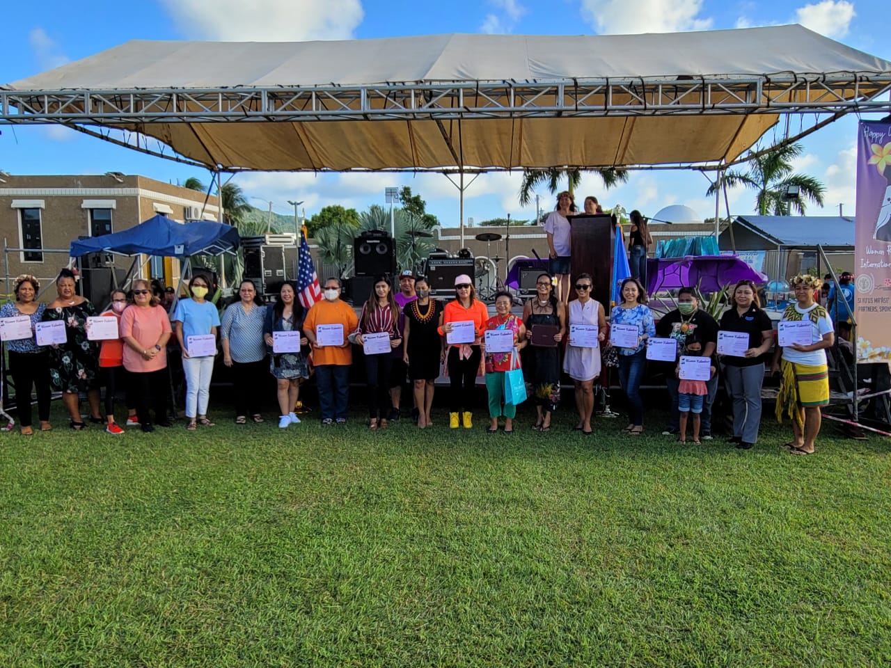 Gov. Ralph DLG Torres and first lady Diann Torres, center, join some of the 44 women who were recognized during the Women Recognition and International Celebration event on the NMI Museum grounds Thursday.