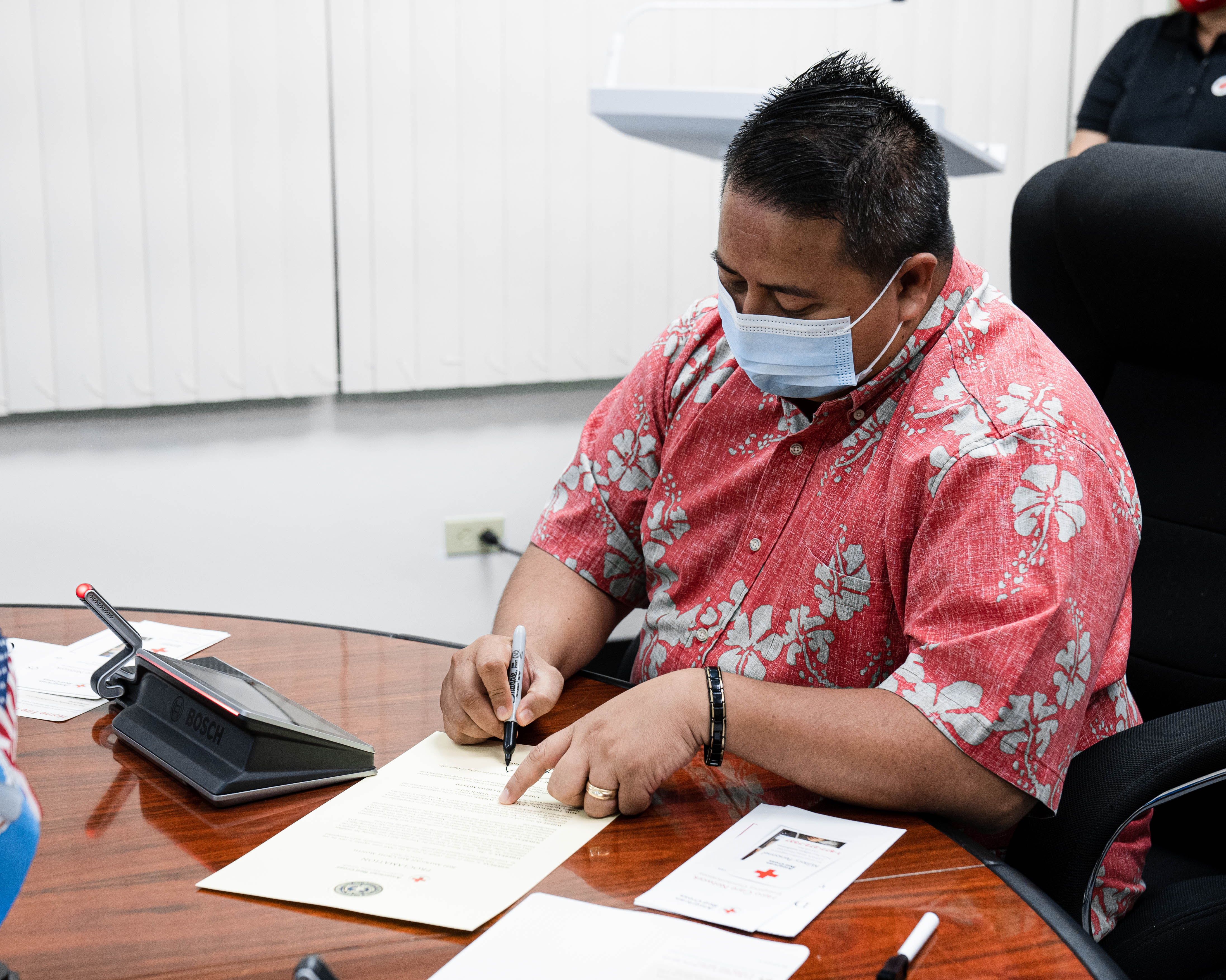 Gov. Ralph DLG Torres signs a proclamation Wednesday designating March as American Red Cross Month.