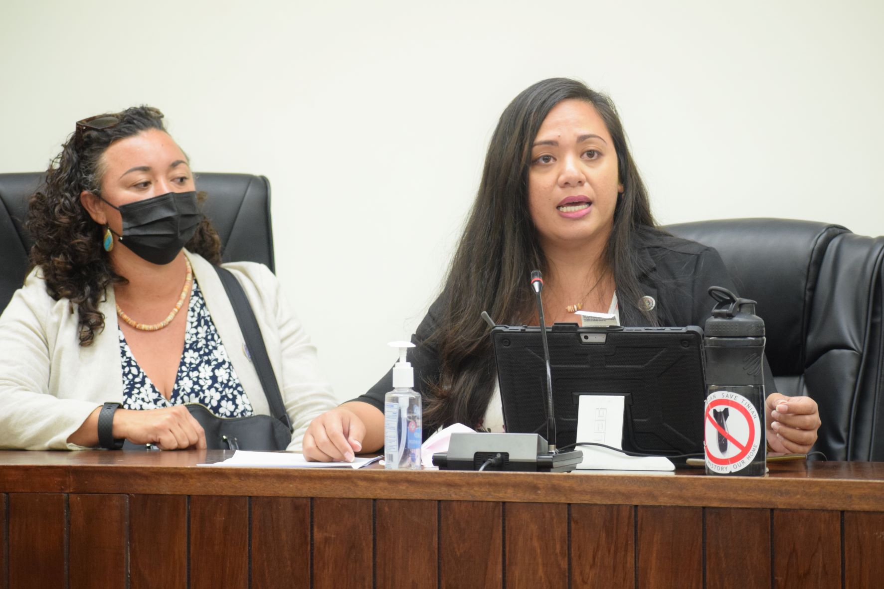 Rep. Sheila Babauta speaks as Rep. Leila Staffler listens during the House leadership's press conference on Tuesday in the House chamber.