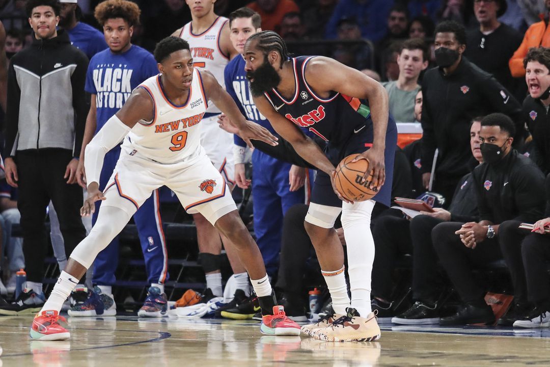 Philadelphia 76ers guard James Harden (1) looks to drive past New York Knicks guard RJ Barrett (9) in the third quarter at Madison Square Garden in New York on Feb. 27, 2022.