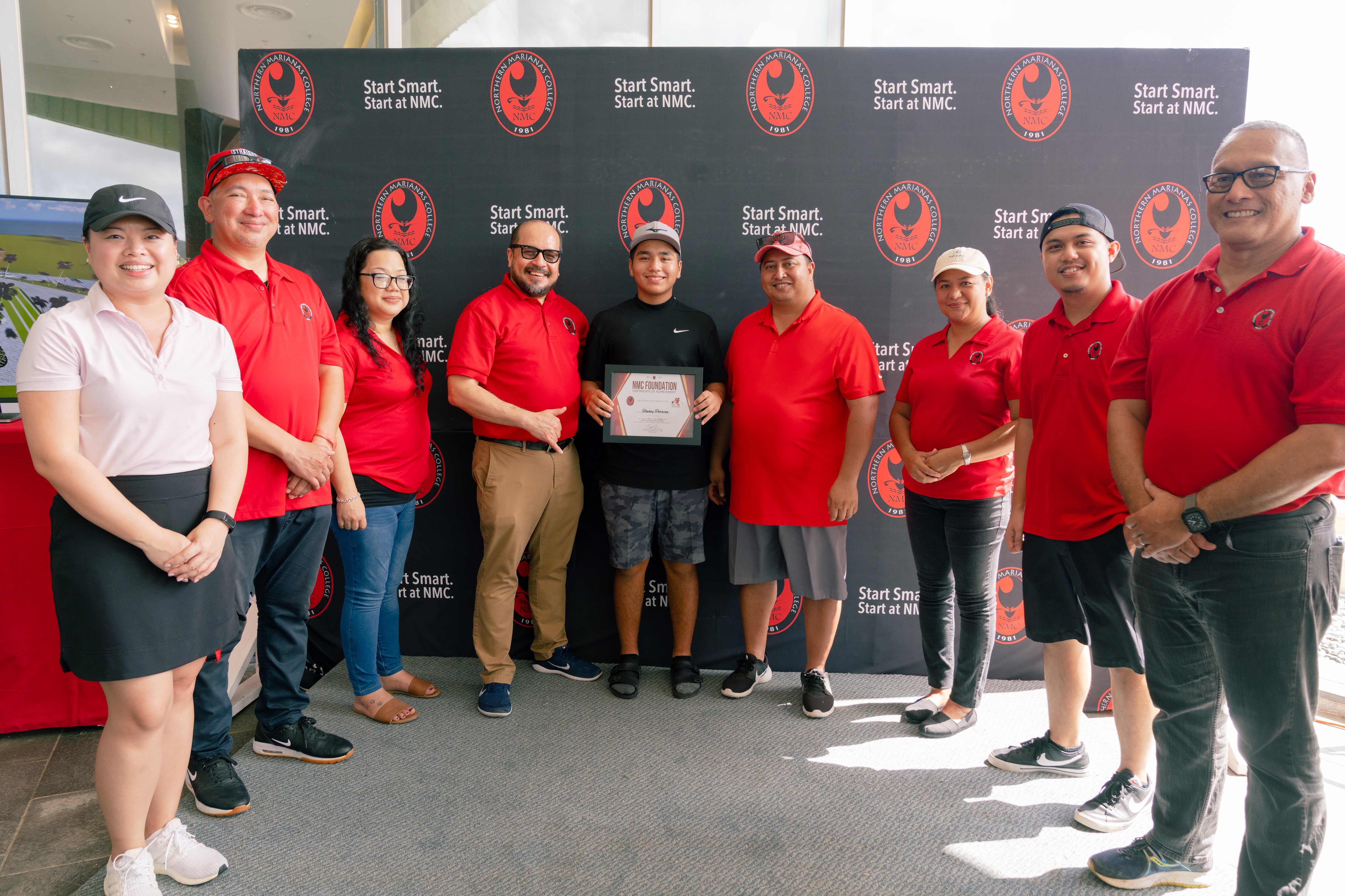 Northern Marianas College Regents Michelle Lin Sablan, Jesse Tudela, Zenie Mafnas, NMC President Galvin Deleon Guerrero, A Flight Stussy Shiroma, Gov. Ralph DLG Torres, NMC Regent Irene Torres, NMC Foundation Board Member Roman Tudela, and NMC Board Chair Charles Cepeda pose for a photo during the awards ceremony of the NMC Golf Open 2022 on Saturday at Laolao Bay Golf & Resort.