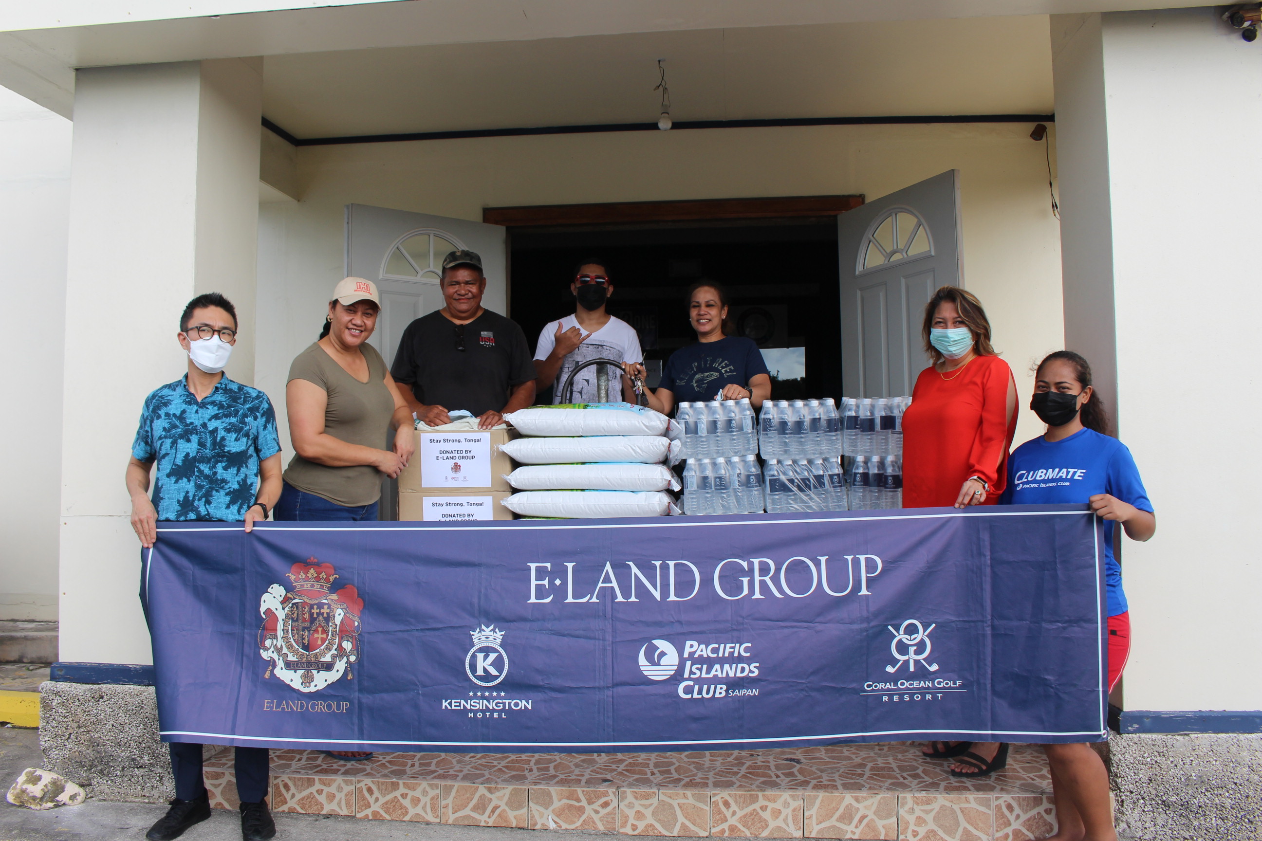 E-Land Group representatives pose for a photo with Tongan community members on Saipan at Life in the Son Christian Fellowship in Gualo Rai on Friday.