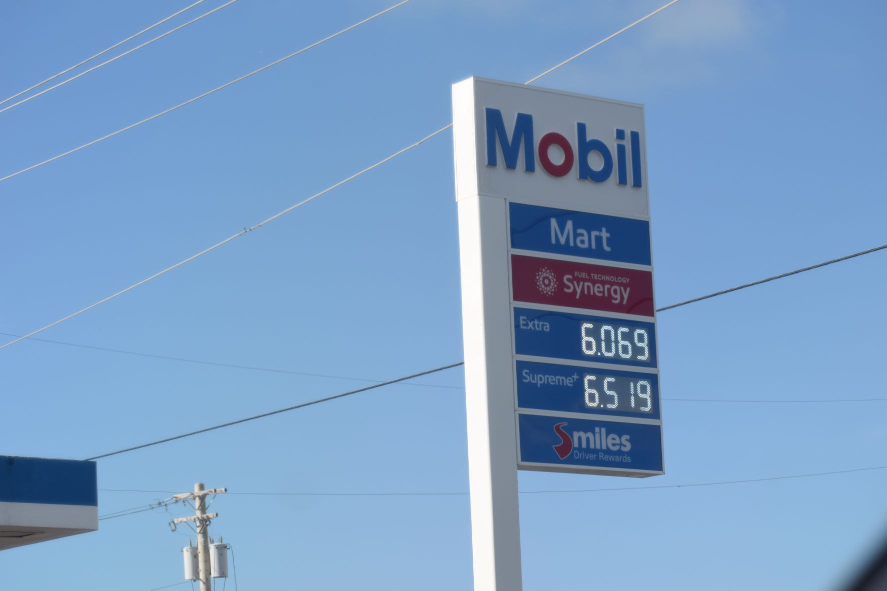 The Mobil Oil Marianas in San Jose displays its new prices on Wednesday afternoon.