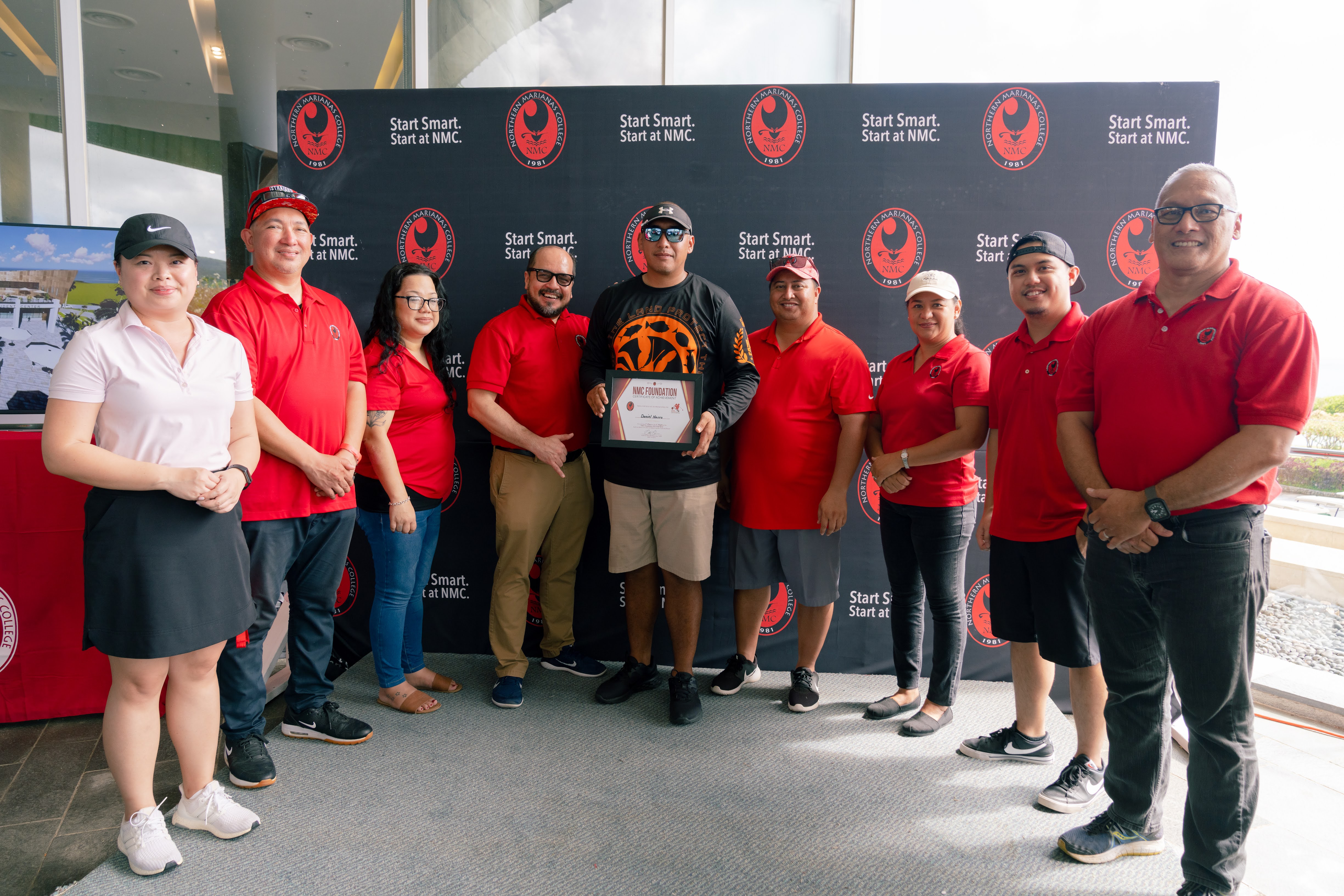 Northern Marianas College Regents Michelle Lin Sablan, Jesse Tudela, Zenie Mafnas, NMC President Galvin Deleon Guerrero, C Flight winner Daniel Narro, Gov. Ralph DLG Torres, NMC Regent Irene Torres, NMC Foundation Board Member Roman Tudela, and NMC Board Chair Charles Cepeda pose for a photo during the awards ceremony of the NMC Golf Open 2022 on Saturday at Laolao Bay Golf & Resort.