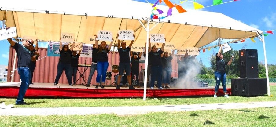 Staff from the Office of the Attorney General, Department of Public Safety, and the Ayuda Network perform an empowering lip sync performance at 2018 S.A.F.E. Jamboree event, which is part of NMCADSV’s Sexual Assault Awareness Month campaign.