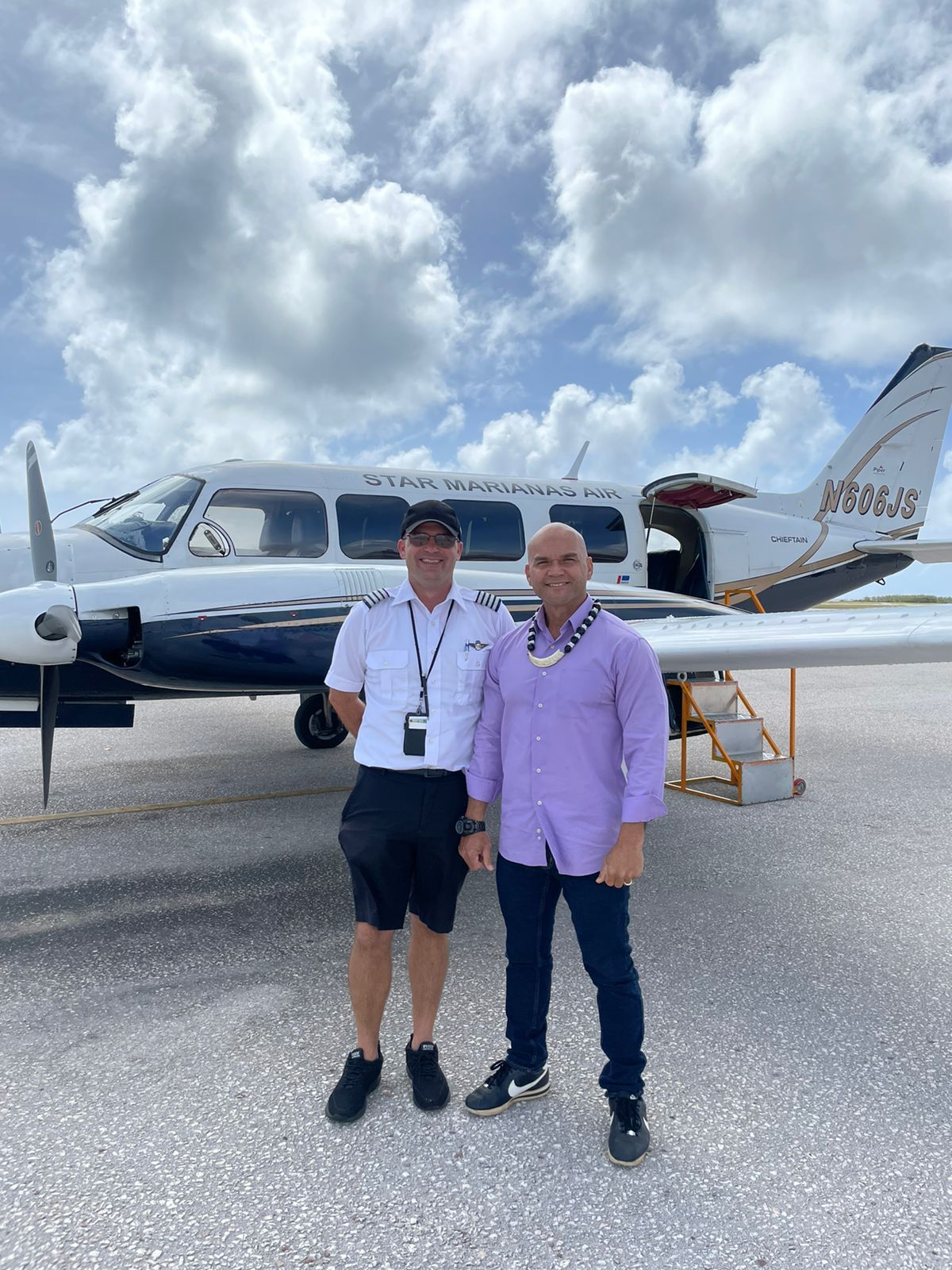 CNMI Veterans Affairs Office Executive Officer Stanley T. Iakopo, right, with Star Marianas Air President Shaun Christian.