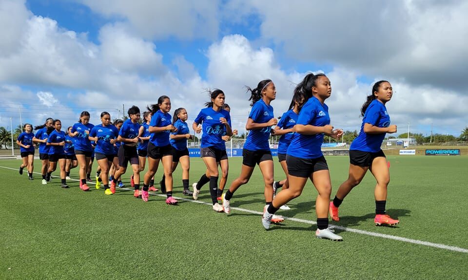 NMI Women’s U18 National Team players warm up for their training session last week during the training camp at the Guam Football Association National Training Center.