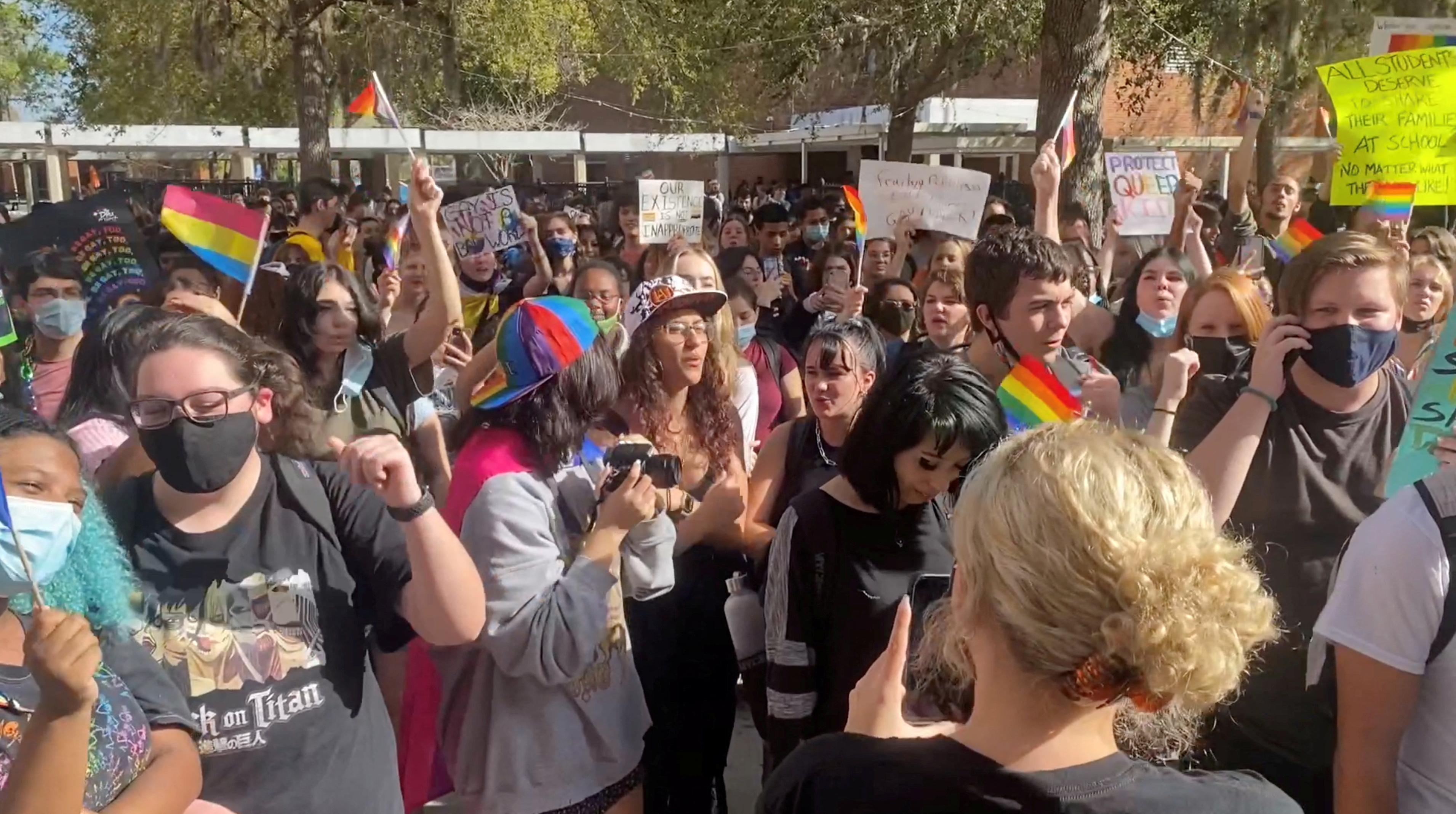 Students gather to protest after Florida's House of Representatives approved a Republican-backed bill that would prohibit classroom discussion of sexual orientation and gender identity, in Winter Park, Florida, March 7, 2022 in this still image obtained from a video posted on social media.