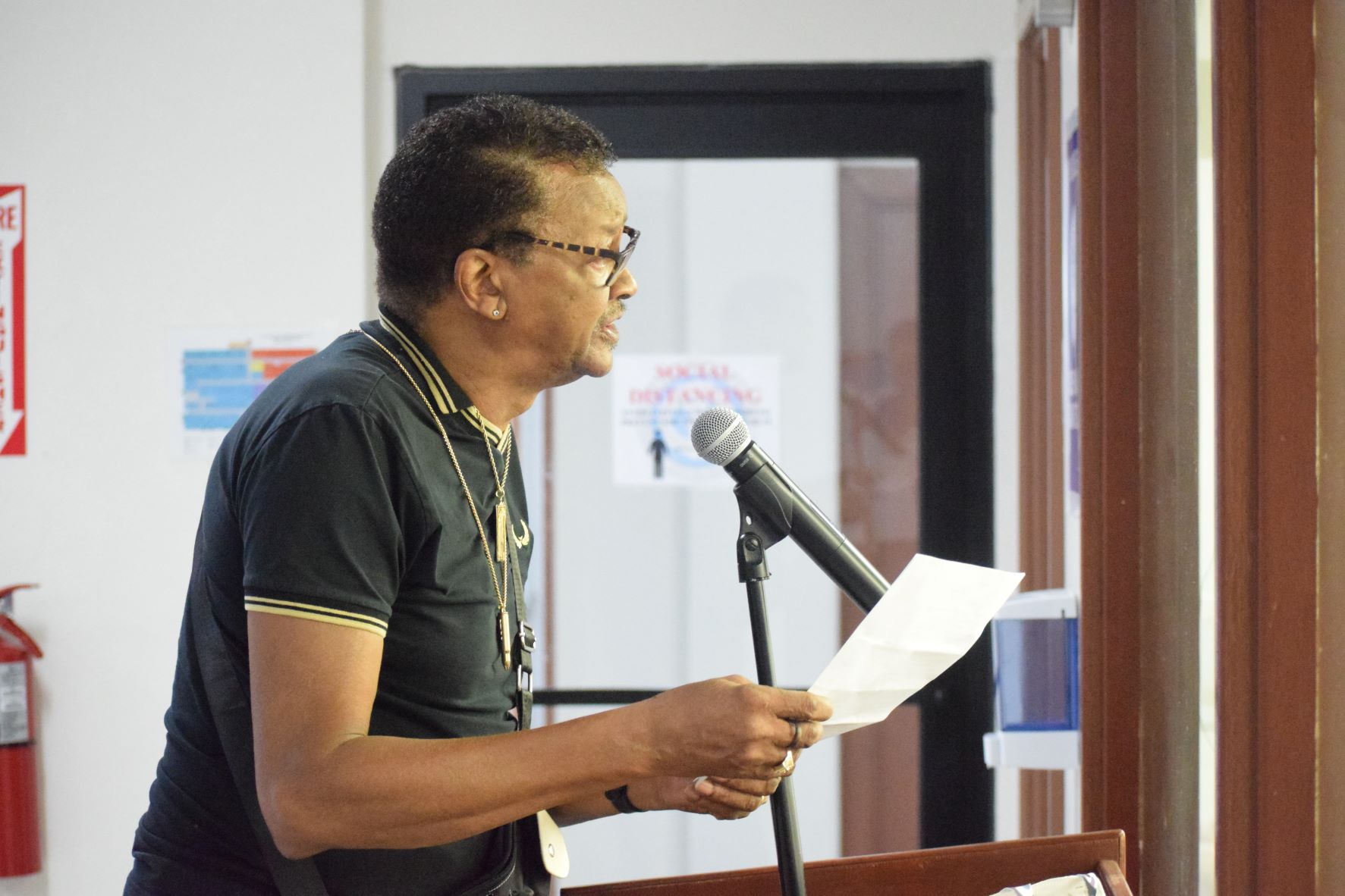 Retired teacher Ambrose Bennett speaks before the House Education Committee on Friday.