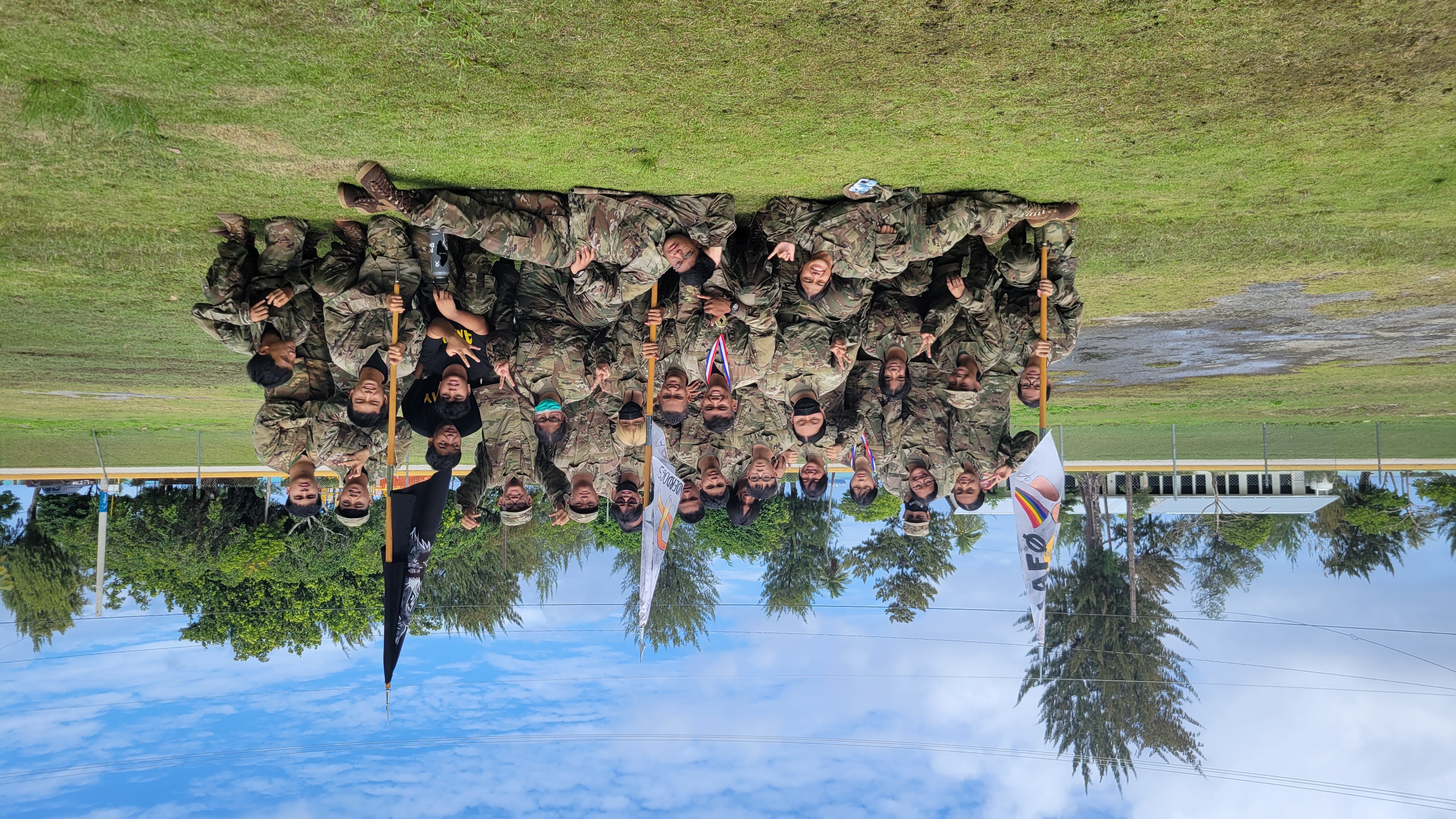 The three teams who competed in this year's Raiders Challenge pose for a photo with their Army instructor.