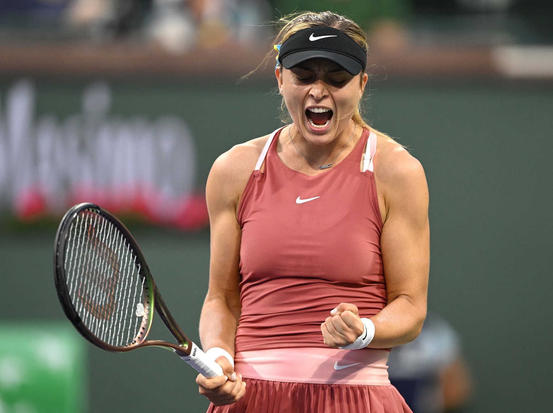 Paula Badosa reacts after winning a point in her third round match against Sara Sorribes Tormo during the BNP Paribas Open at the Indian Wells Tennis Garden in Indian Wells, California on March 14, 2022.