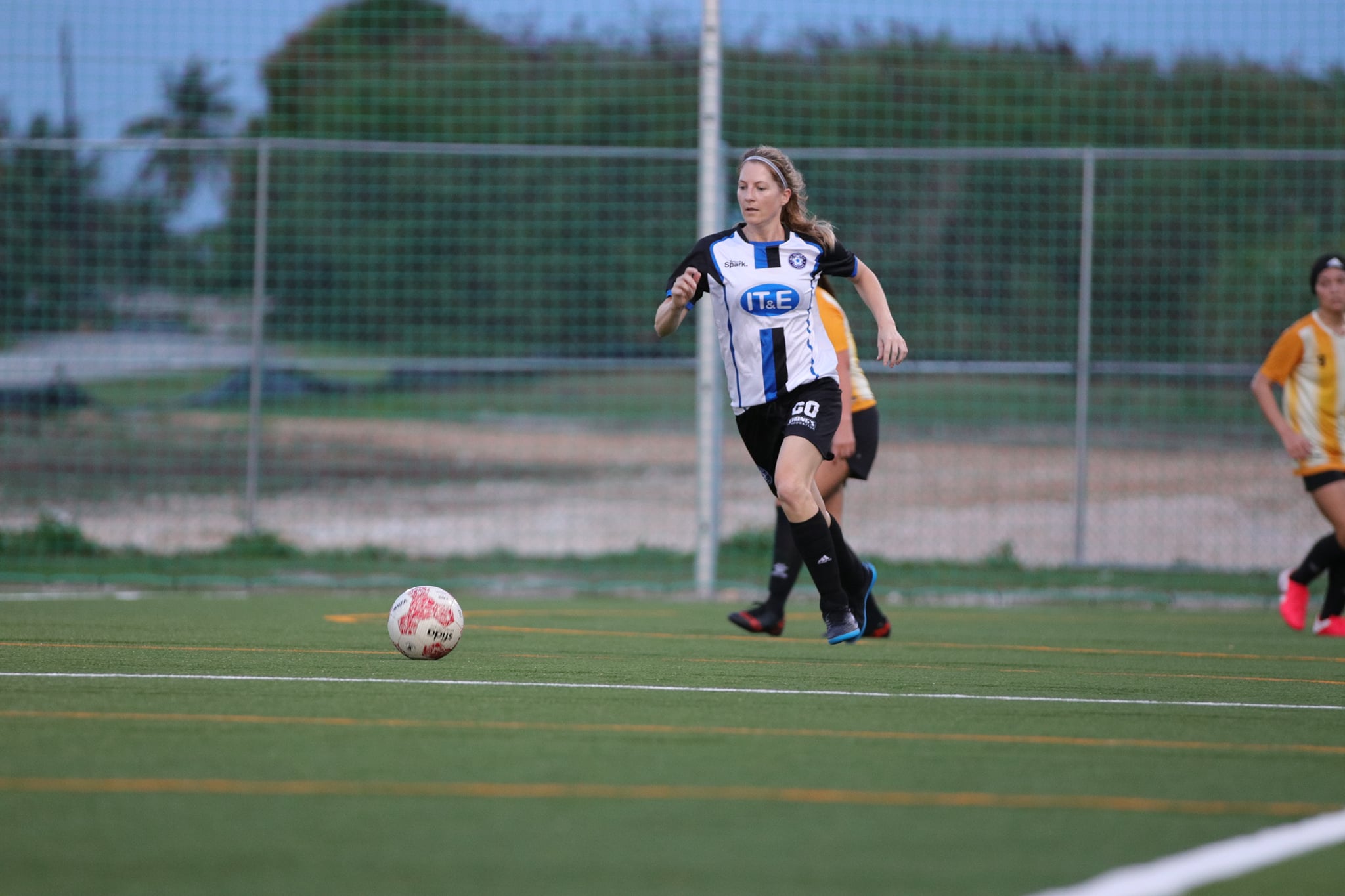 MPU's Breanna Copeland pushes forward during a Spring 2022 Dove Women's League game Sunday at the NMI Soccer Training Center.
