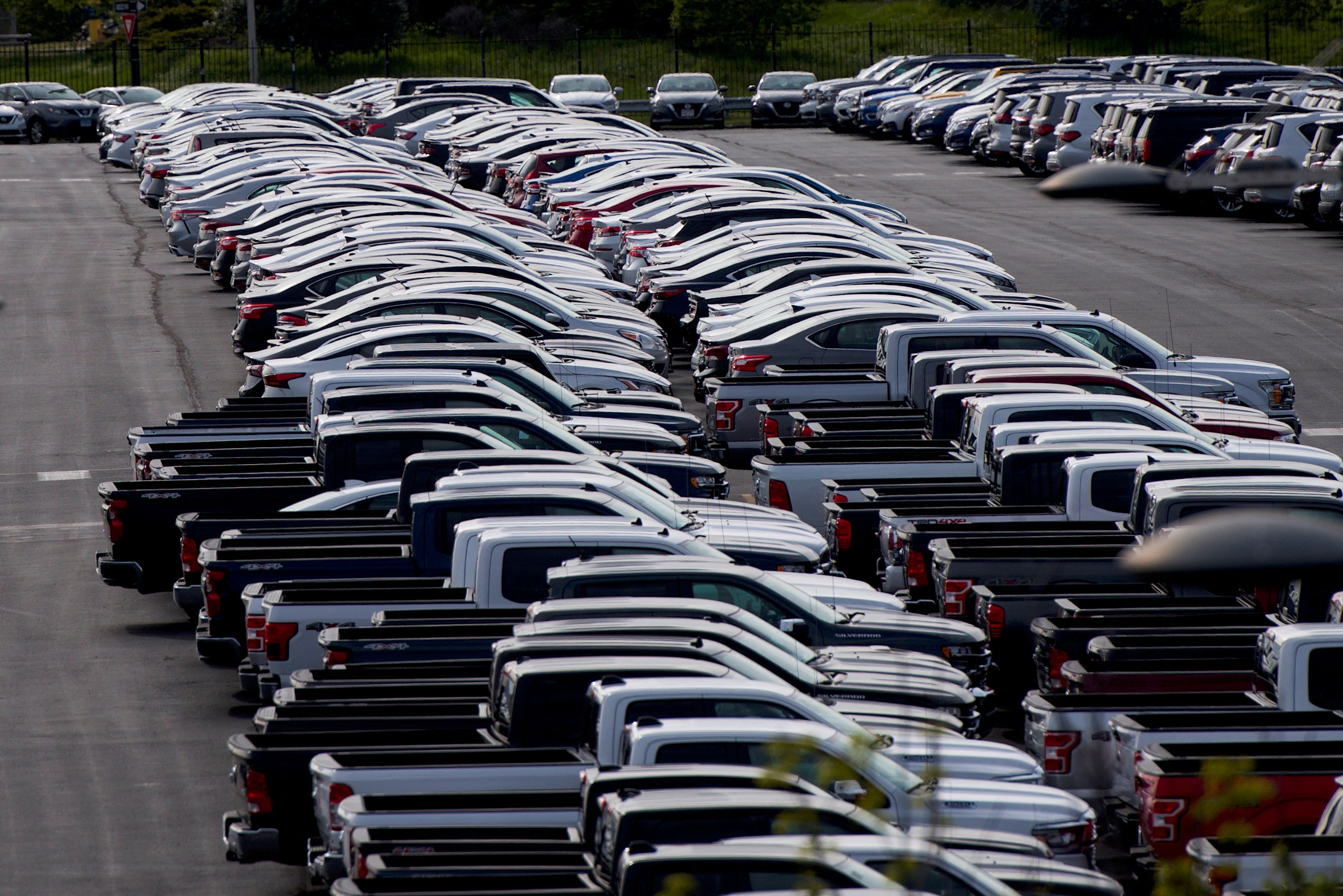 Cars unsold due to the autos market slowdown caused by the coronavirus disease are seen stored in the parking lot of the Wells Fargo Center in Philadelphia, Pennsylvania, April 28, 2020.