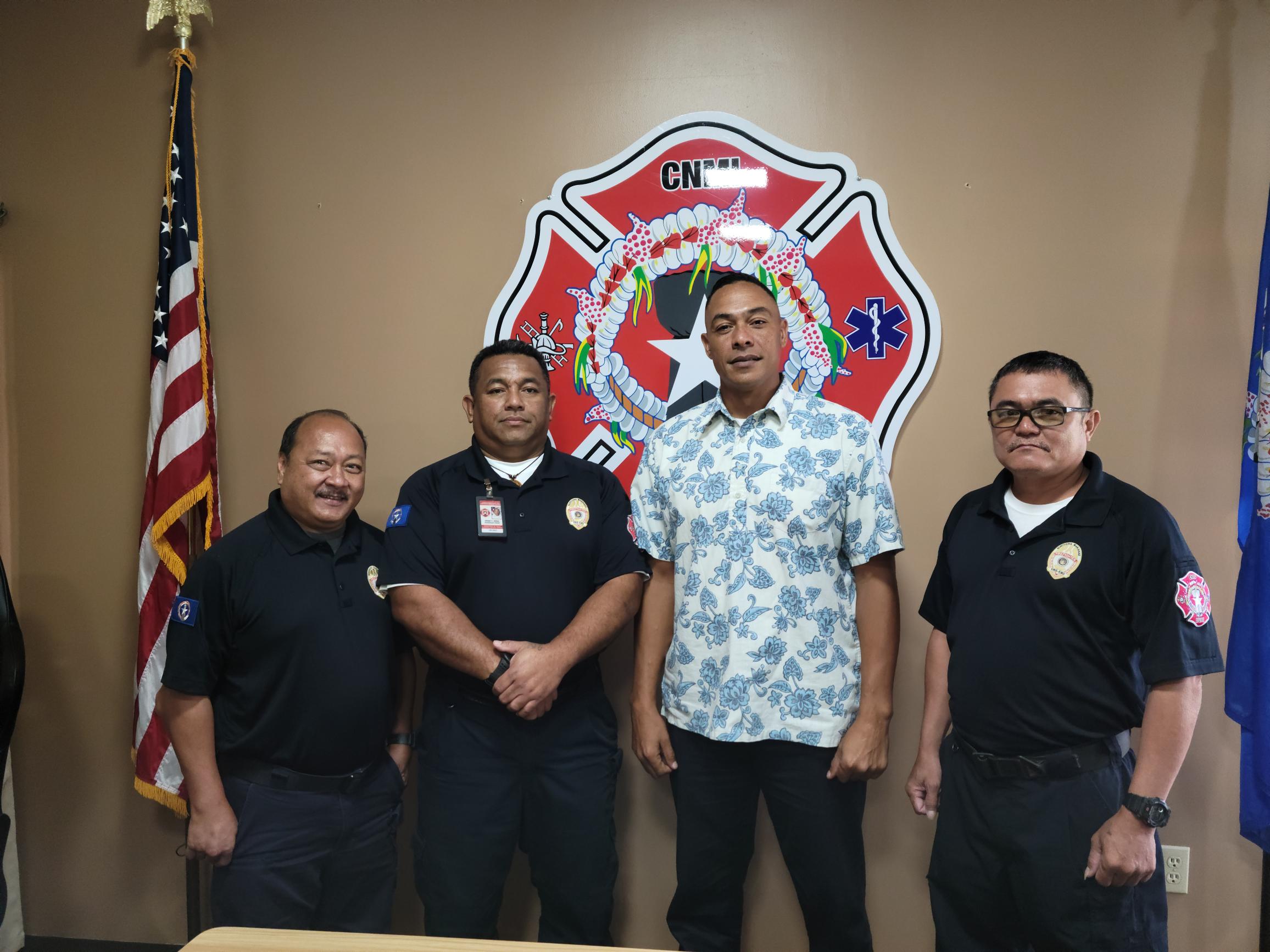 Department of Fire and Emergency Medical Services Commissioner Dennis Mendiola, with Fire Chief Jessie Mesa and Rota and Tinian DFEMS Resident Directors Steve Mesngon and Ray Dela Cruz.