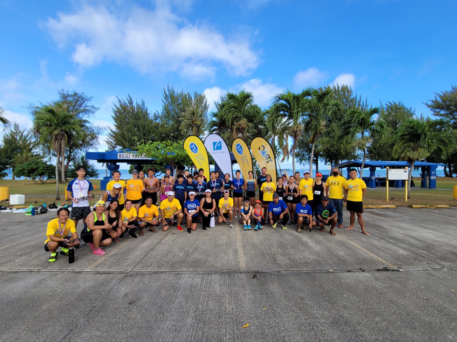 The participants of the 7th Aquathon and 10km Pathway pose for a group photo.