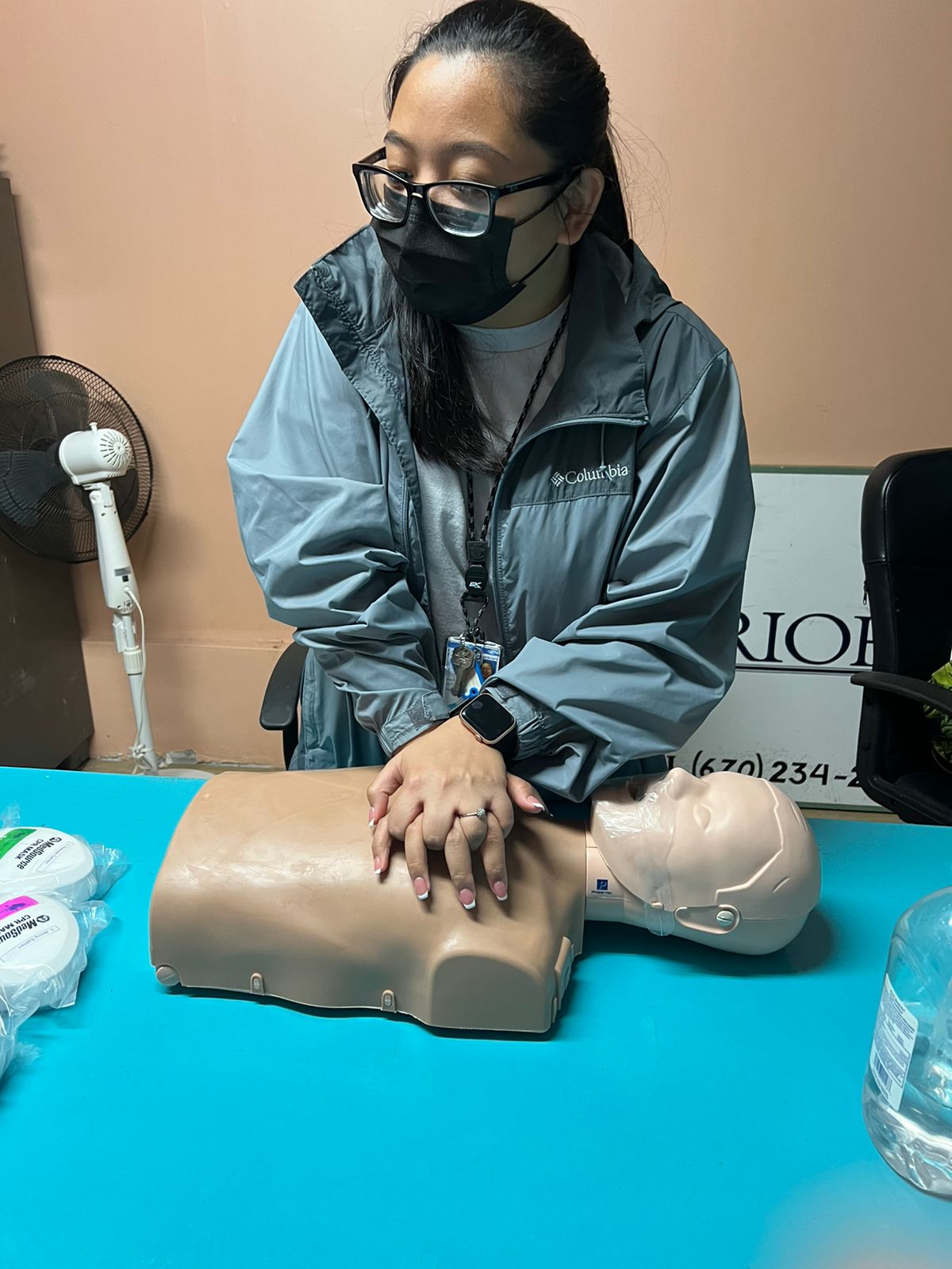 CHCC Community Guidance Center employee Desirae Deleon Guerrero ensures proper hand placement before continuing her chest compressions during the cardiopulmonary resuscitation or CPR portion of the training.