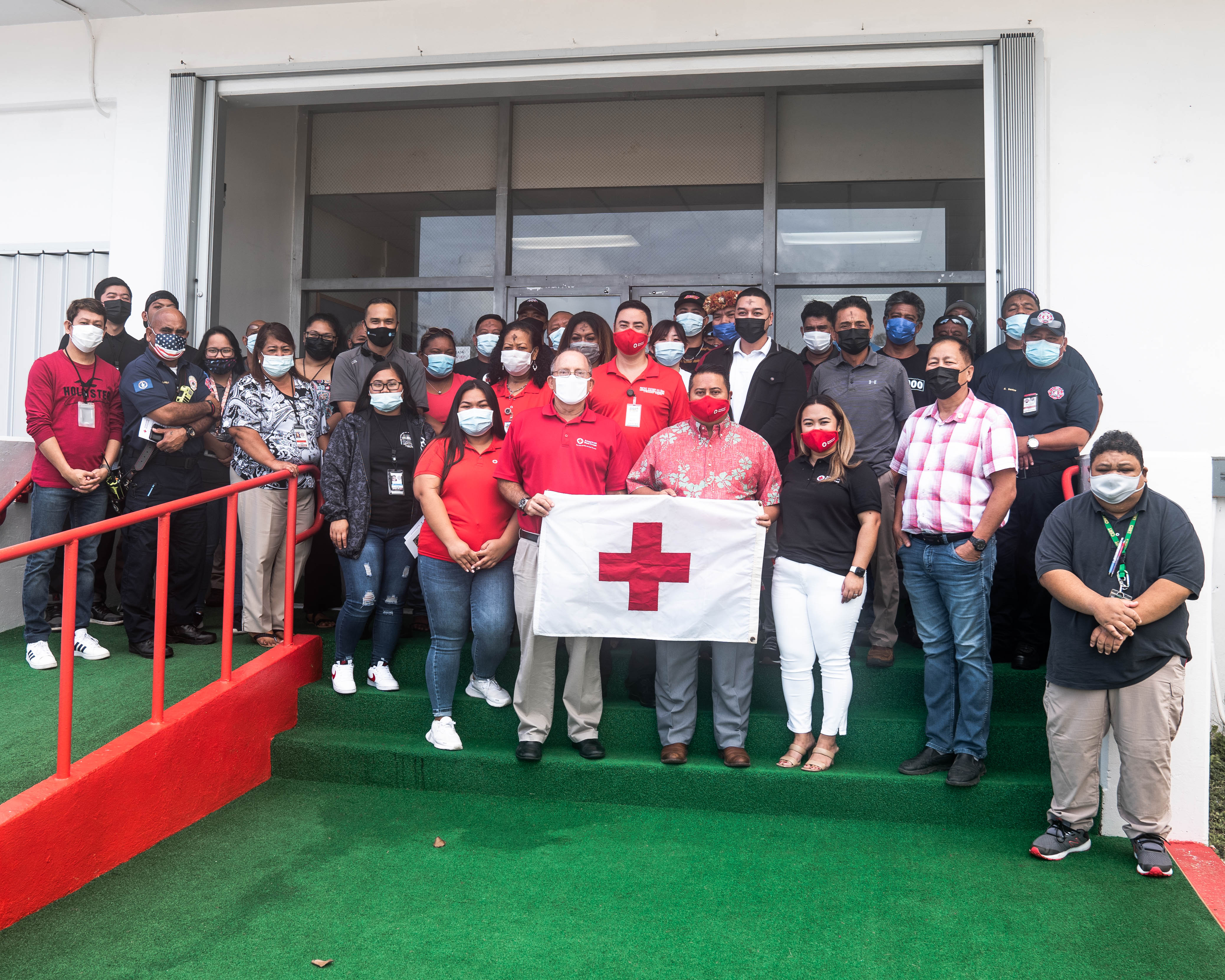 Gov. Ralph DLG Torres poses for a photo with American Red Cross-NMI chapter officials, volunteers, government personnel and other community members after signing a proclamation designating March as American Red Cross Month.