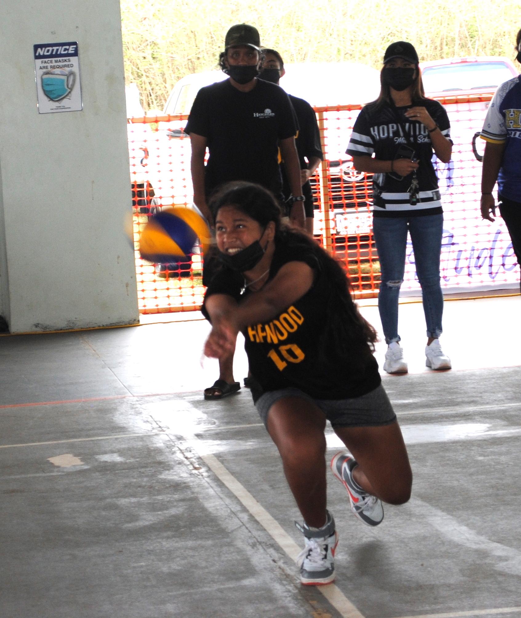 A Hopwood Middle School player reaches for the save.