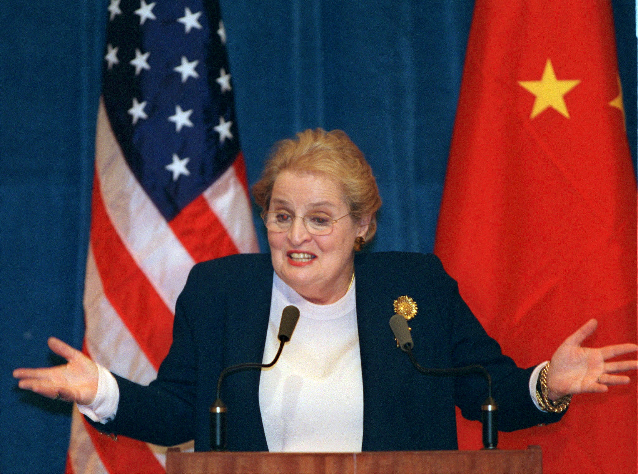 U.S. Secretary of State Madeline Albright reacts to a journalist's question during a press briefing in Beijing, China in this file photo.