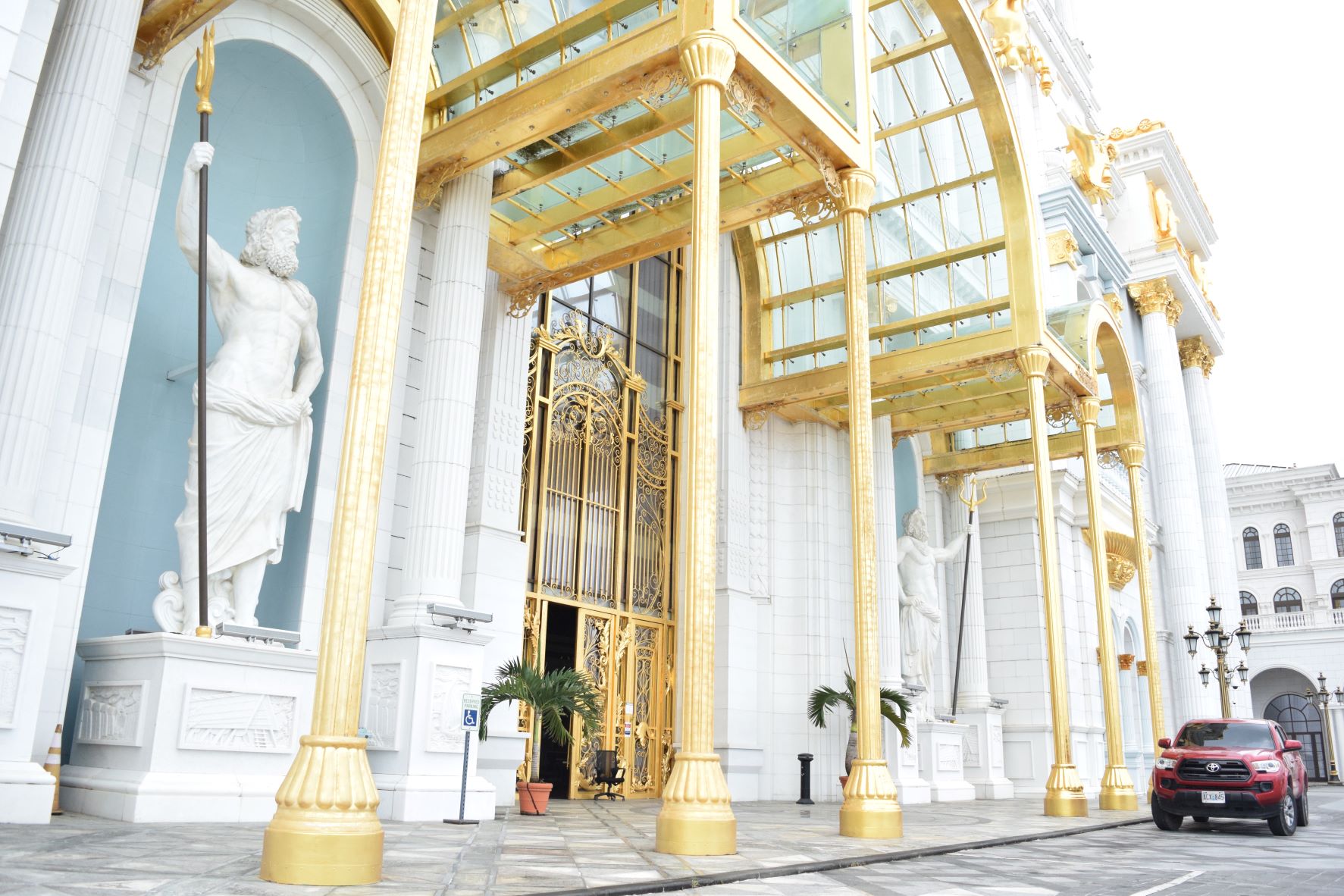 The statues of Poseidon, the  Greek god of the sea, are seen at the entrance of Imperial Pacific International casino in Garapan.