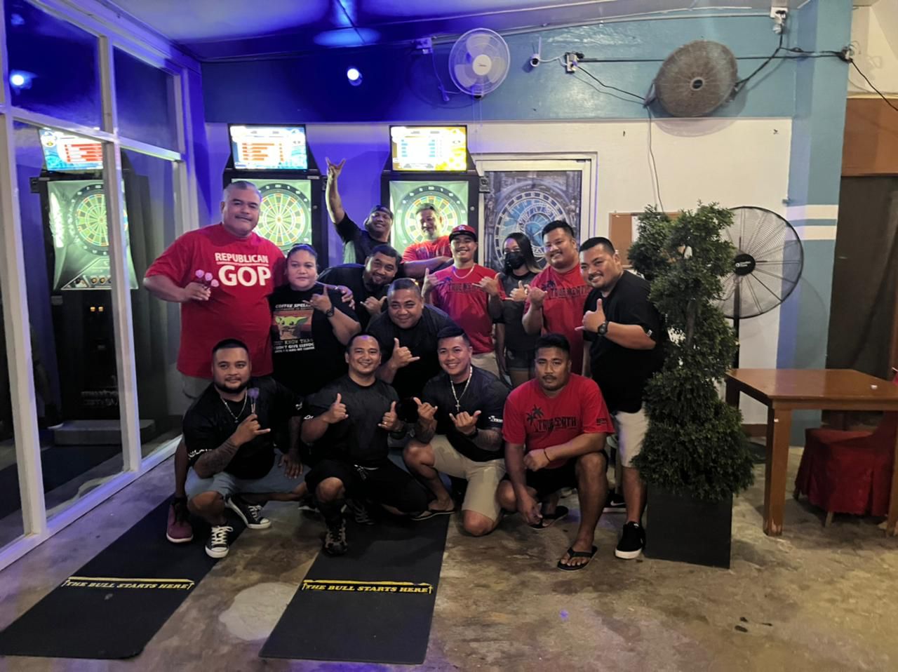 True North Covid 8 team members pose for a photo after winning the Inter-Government Bud Light Cup of the SEDA League Friday at True North Bar.