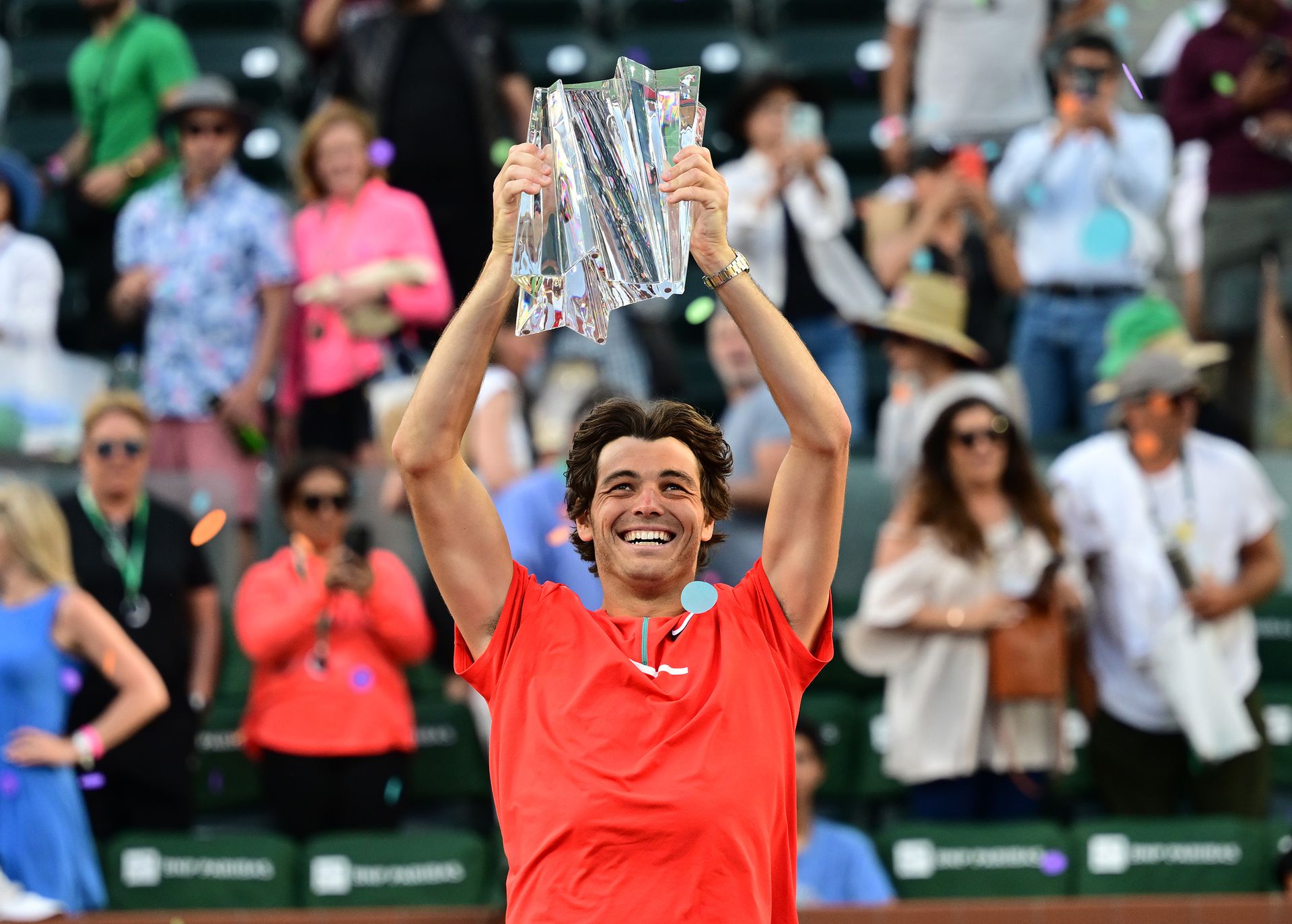 Taylor Fritz holds the championship trophy after defeating Rafael Nadal in the men’s final at the Indian Wells Tennis Garden in Indian Wells, California on March 20, 2022.