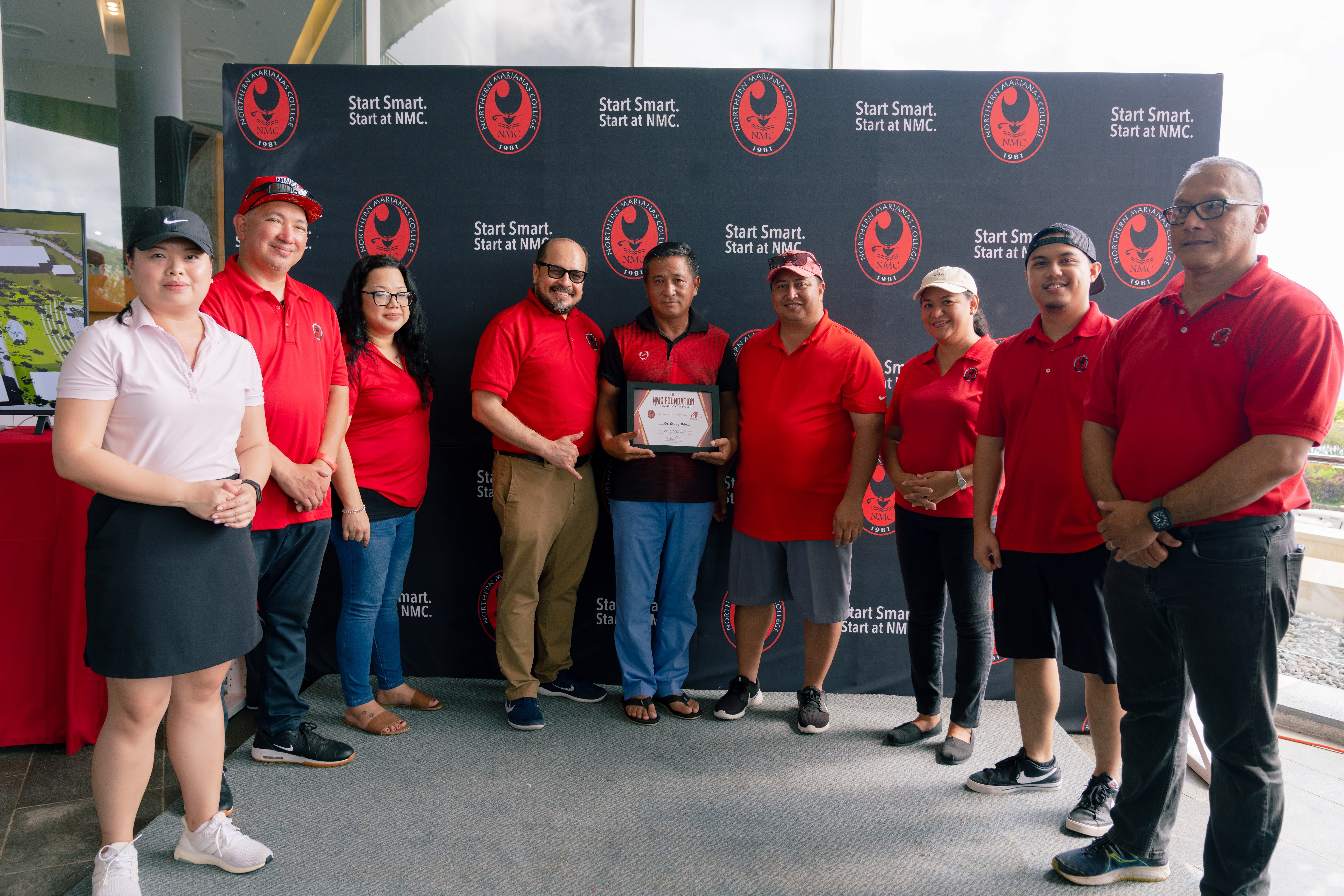 Northern Marianas College Regents Michelle Lin Sablan, Jesse Tudela, Zenie Mafnas with NMC President Galvin Deleon Guerrero pose for a photo with Championship Flight winner Gi Yeong Kim, Gov. Ralph DLG Torres, NMC Regent Irene Torres, NMC Foundation Board Member Roman Tudela, and NMC Board Chair Charles Cepeda during the awards ceremony of the NMC Golf Open 2022 on Saturday at Laolao Bay Golf & Resort.