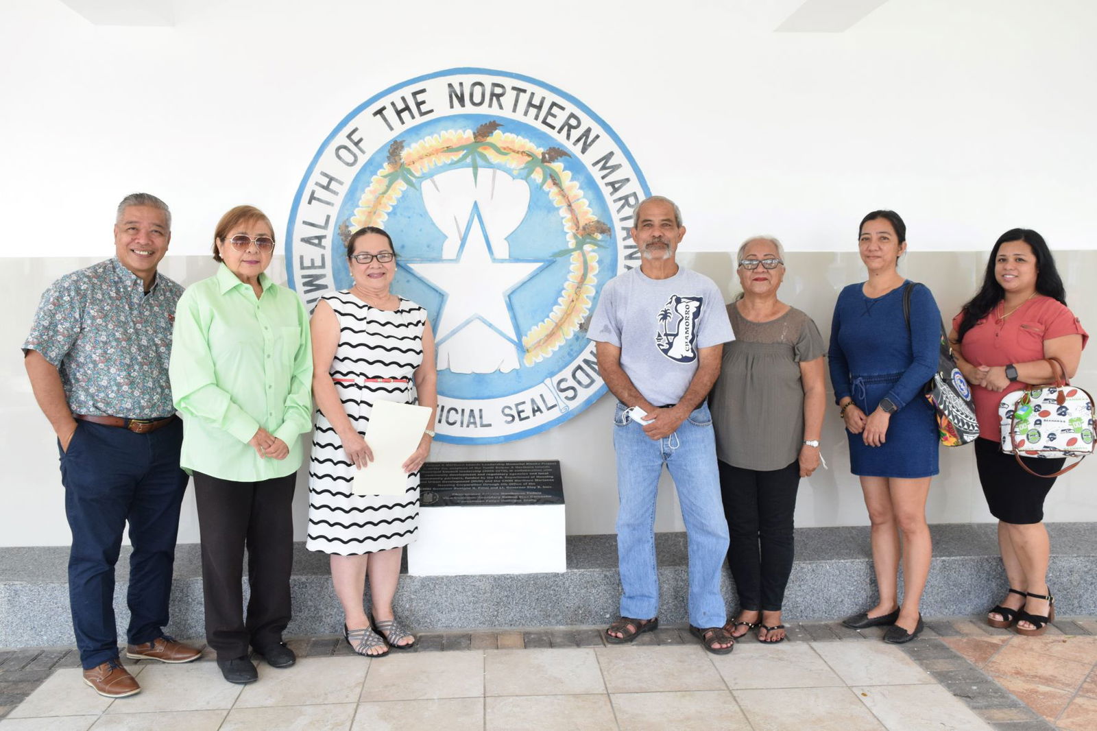 At the Kiosku Round House in Chalan Kanoa on Friday, Master of Arts and Culture Eusebio Camacho Borja, 4th right, poses for a photo with, from left, Saipan and Northern Islands Municipal Council Secretary Daniel I. Aquino, Vice Chair Antonia M. Tudela and Chairwoman Ana Demapan-Castro. Also in the photo are Eusebio's wife Margarita and daughters, Ann Margaret and Rose Marie