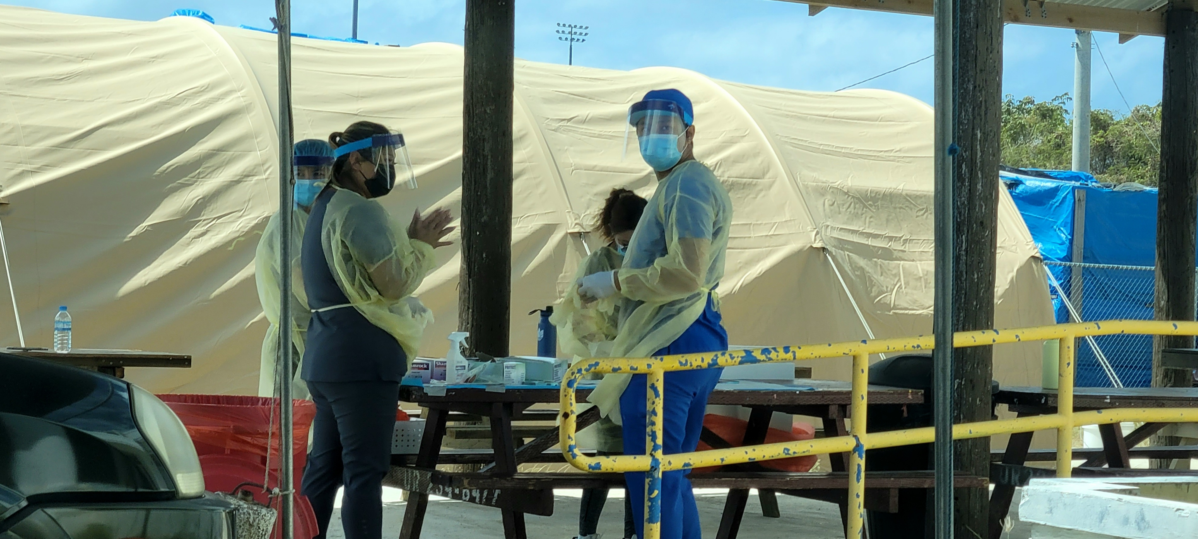Frontliners prepare to administer drive-thru Covid-19 tests at the Koblerville Covid-19 Community Center.