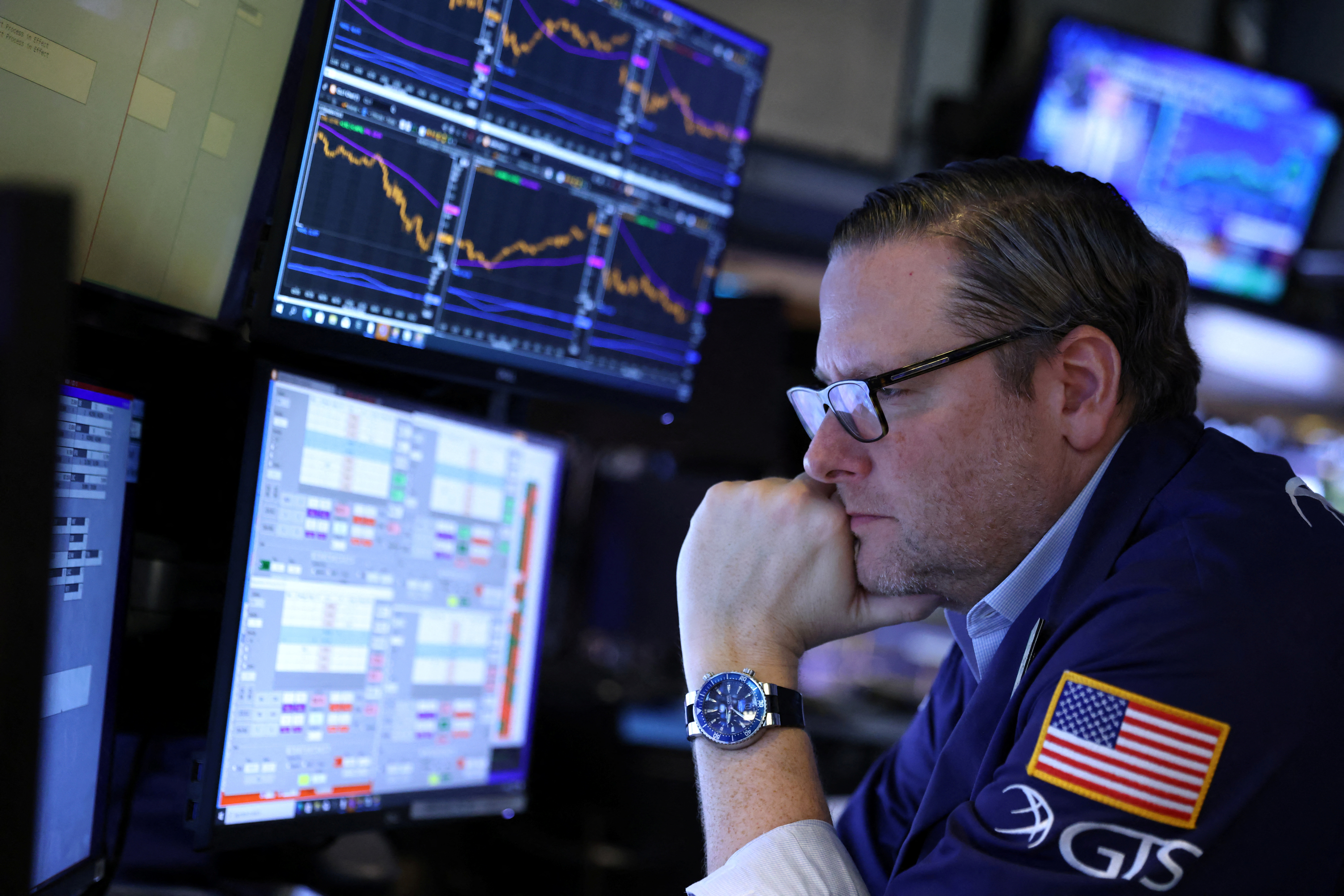 A trader works at the New York Stock Exchange in Manhattan, New York City, March 7, 2022.