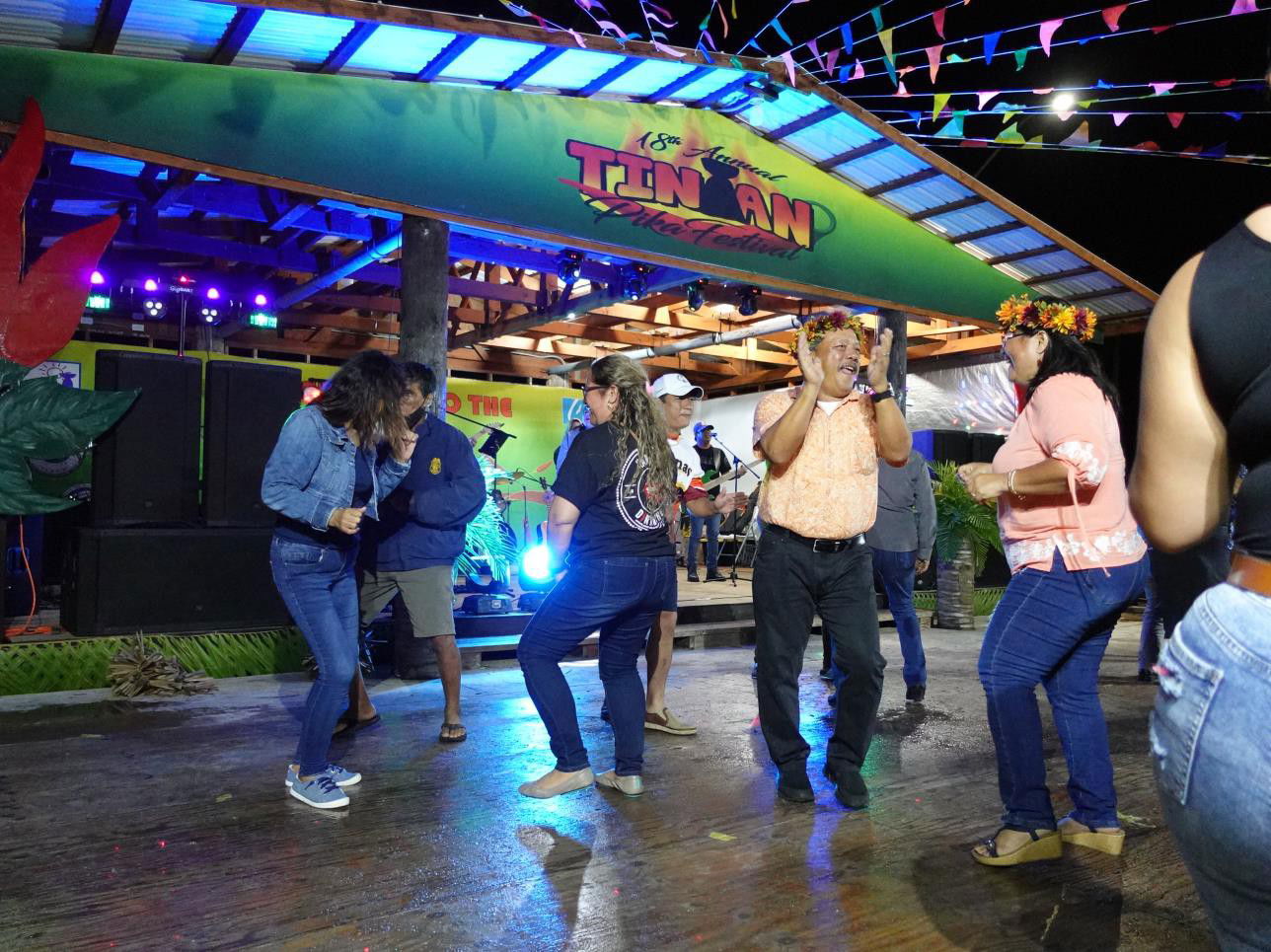 Mayor of Tinian & Aguiguan Edwin Aldan, second right, and his wife hit the dance floor at the 18th Annual Tinian Hot Pepper Festival on March 11, 2022, in San Jose, Tinian.