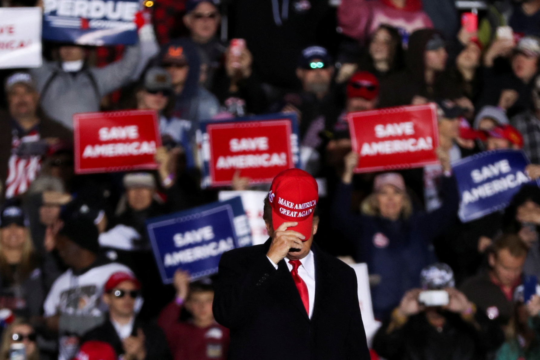 Former President Donald Trump holds a rally in Commerce, Georgia on March 26, 2022.