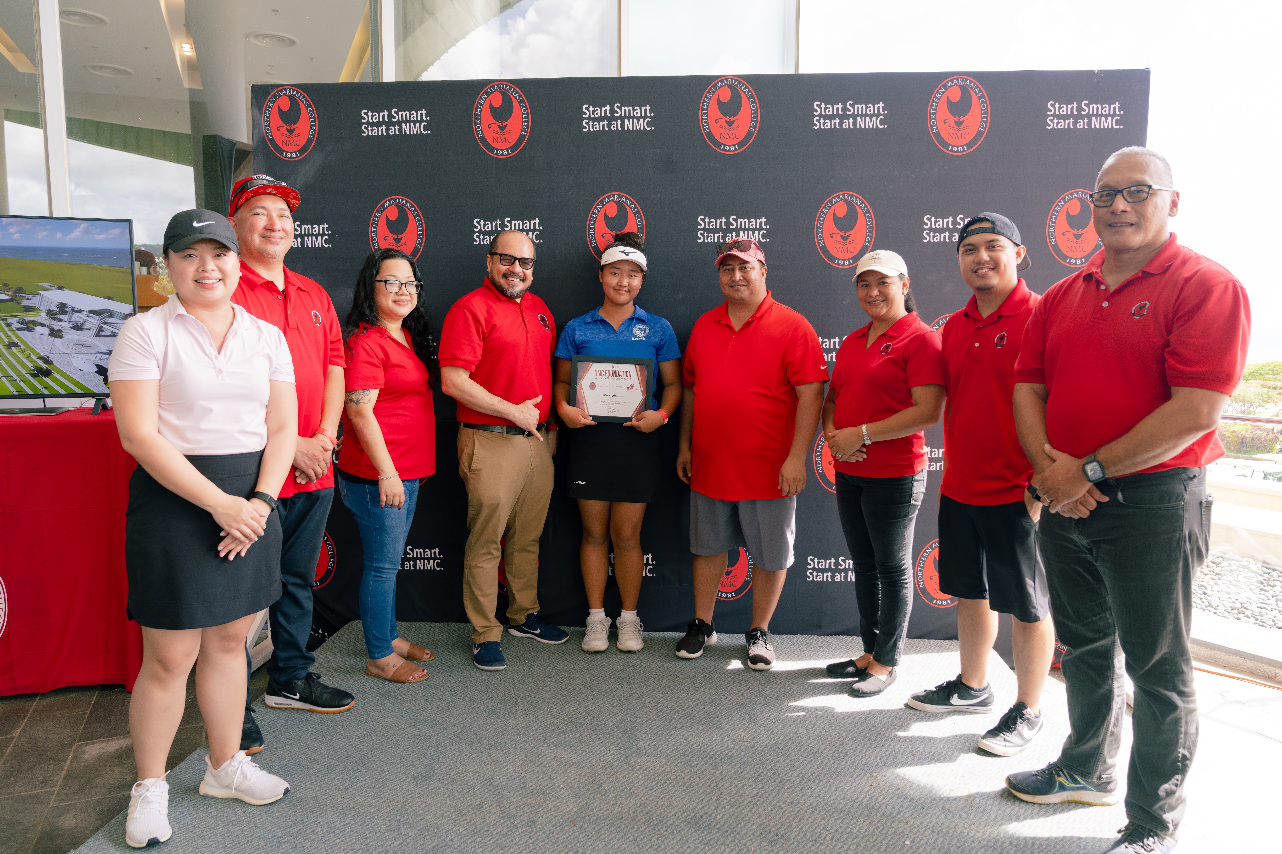 Northern Marianas College Regents Michelle Lin Sablan, Jesse Tudela, Zenie Mafnas with NMC President Galvin Deleon Guerrero, Ladies Low Gross winner Zhimin Jin, Gov. Ralph DLG Torres, NMC Regent Irene Torres, NMC Foundation Board Member Roman Tudela, and NMC Board Chair Charles Cepeda pose for a photo during the awards ceremony of the NMC Golf Open 2022 on Saturday at Laolao Bay Golf & Resort.