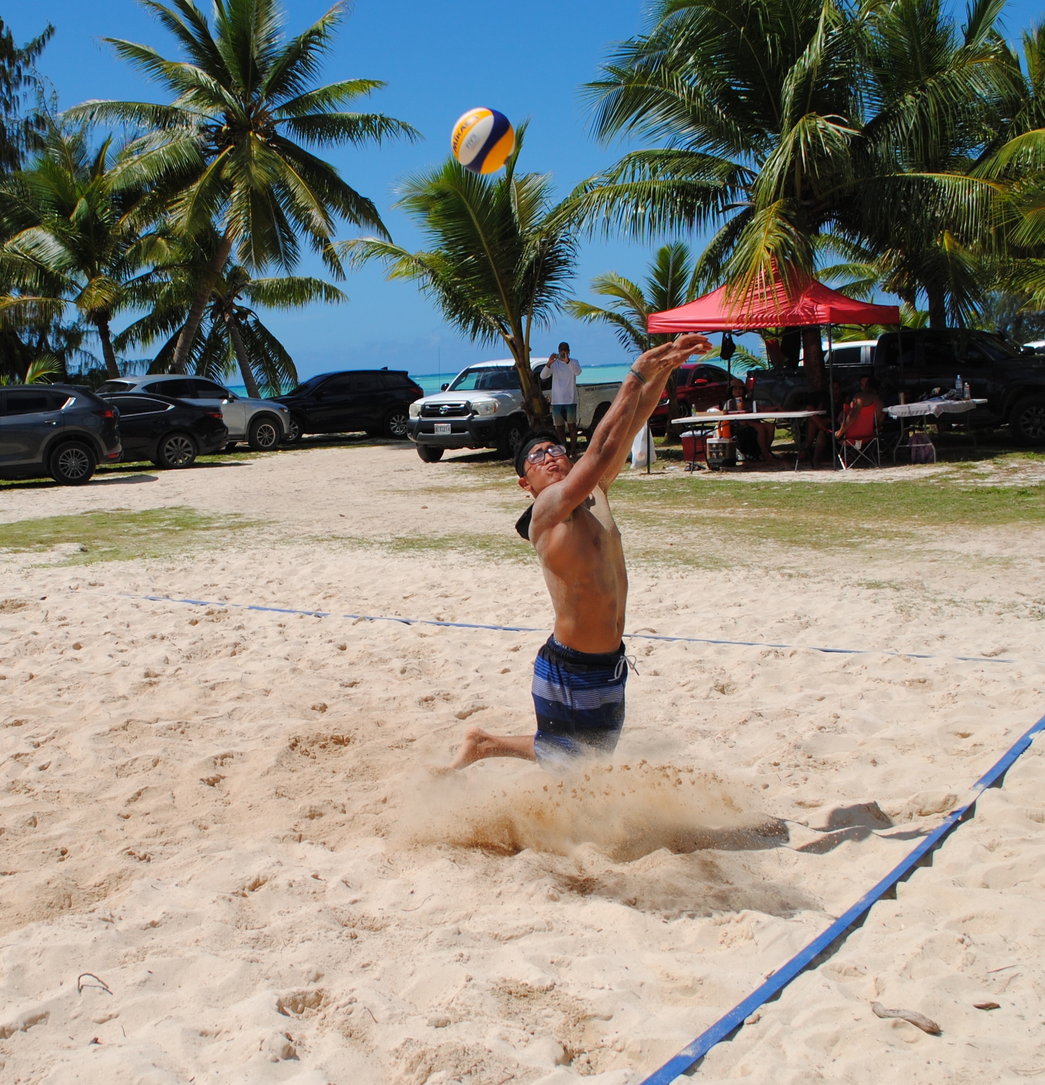 Jakey Deleon Guerrero dives for the save.