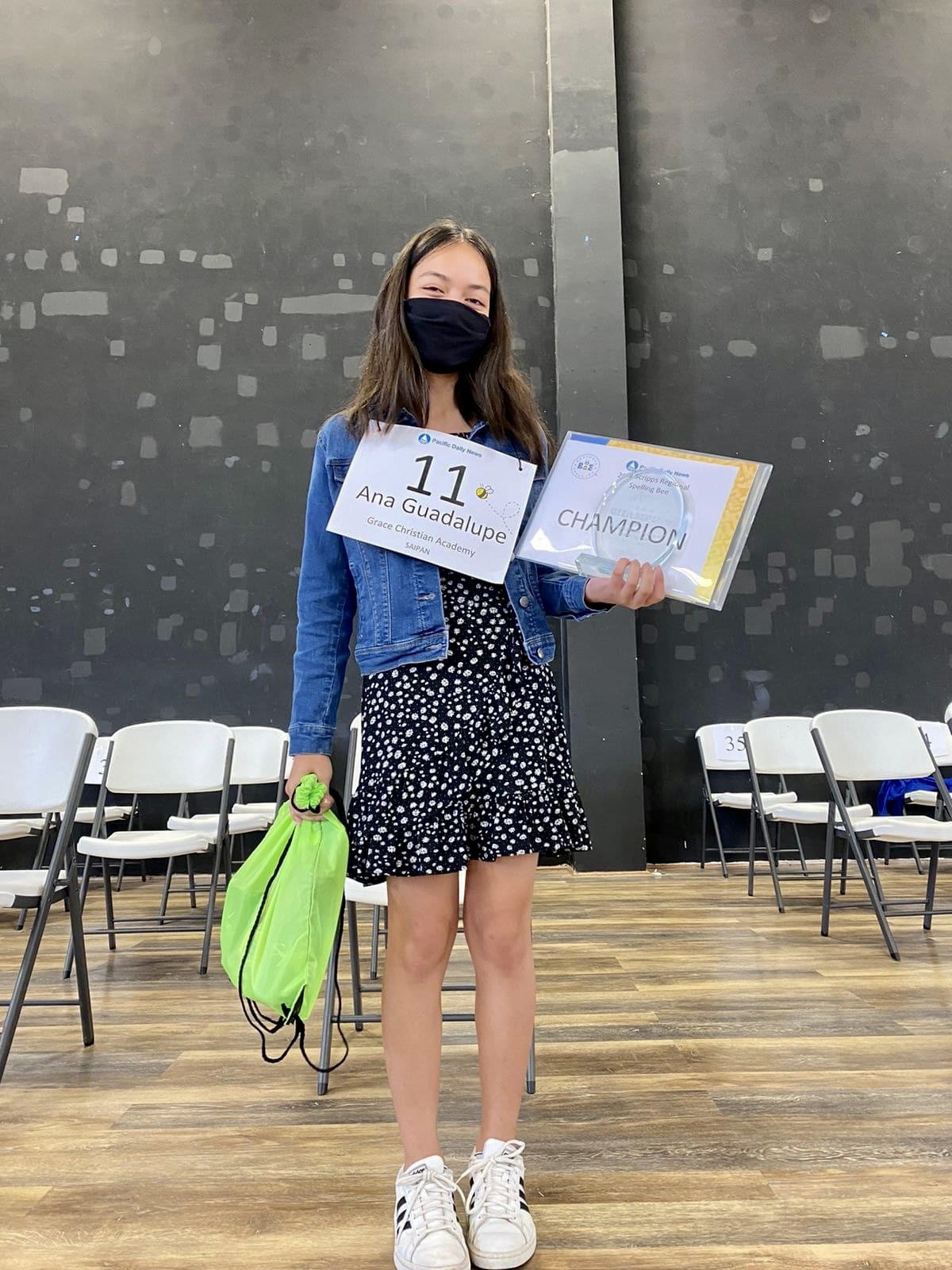 Grace Christian Academy student Ana Guadalupe Villagomez poses for a photo after winning the 2022 Scripps Regional Spelling Bee on Saturday at the Tiyan High School gym on Guam.