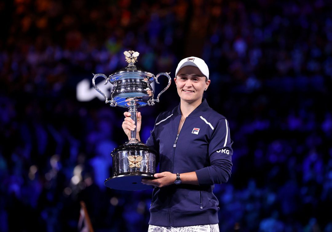 Australia's Ashleigh Barty poses with the trophy as she celebrates winning the Australian Open final against Danielle Collins of the U.S. at Melbourne Park, Melbourne, Australia on Jan. 29, 2022