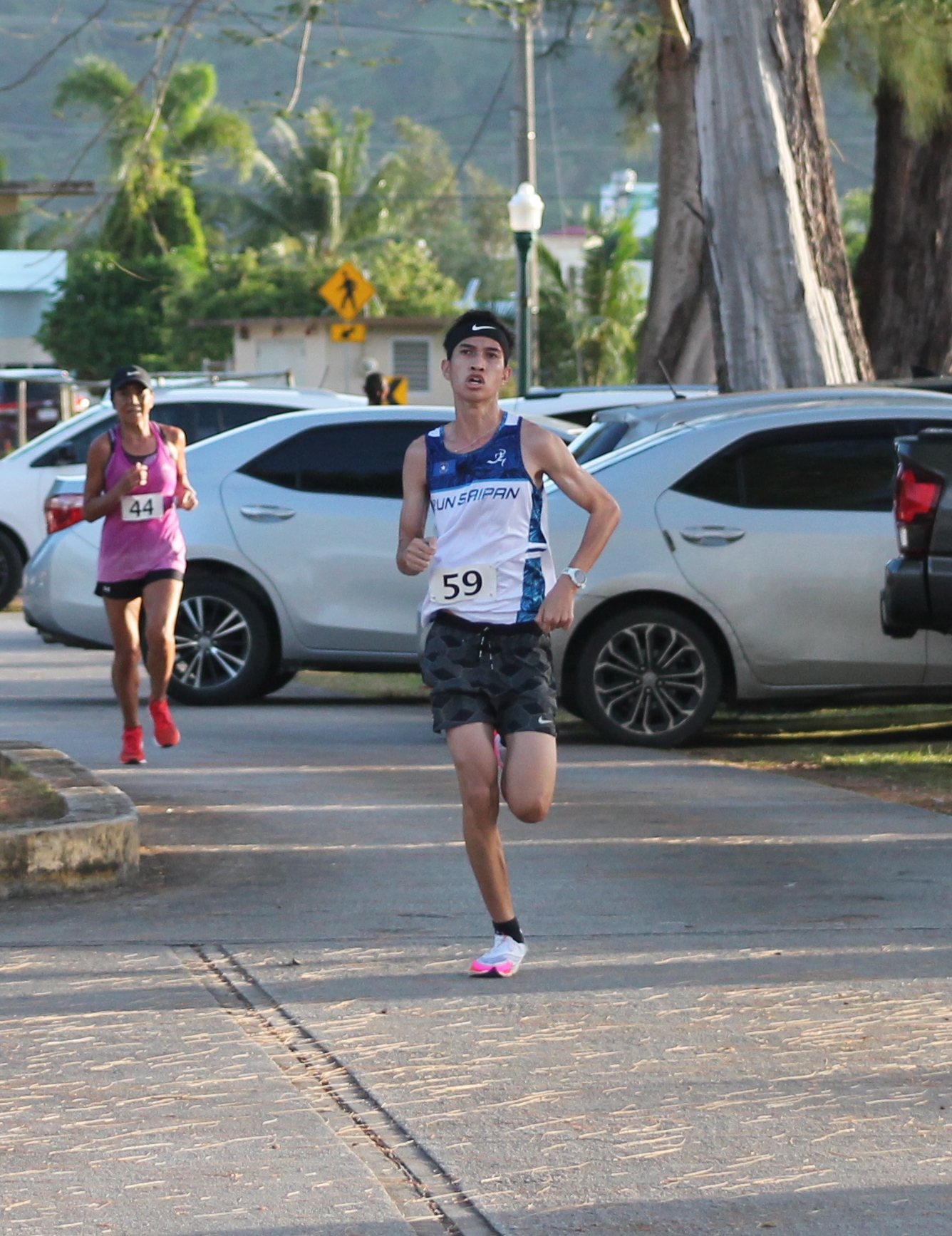 Sildrey Veloria pushes through the finish line. 