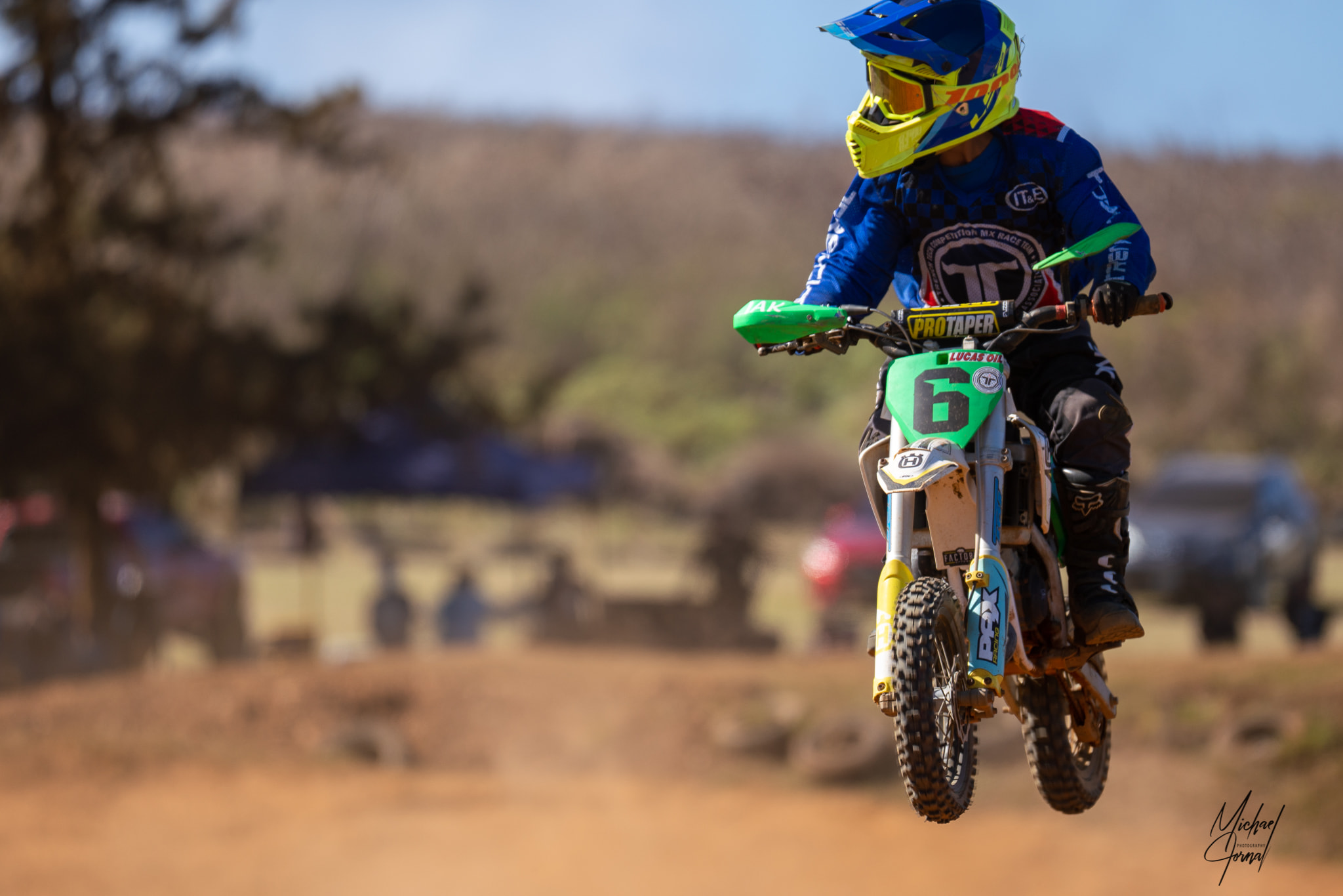 Conan Iakopo looks on as he lands a jump in round 2 of the 2022 Marianas Racing Association  Points Race Series, Peewee II class at  Cowtown Raceway Park on Sunday.