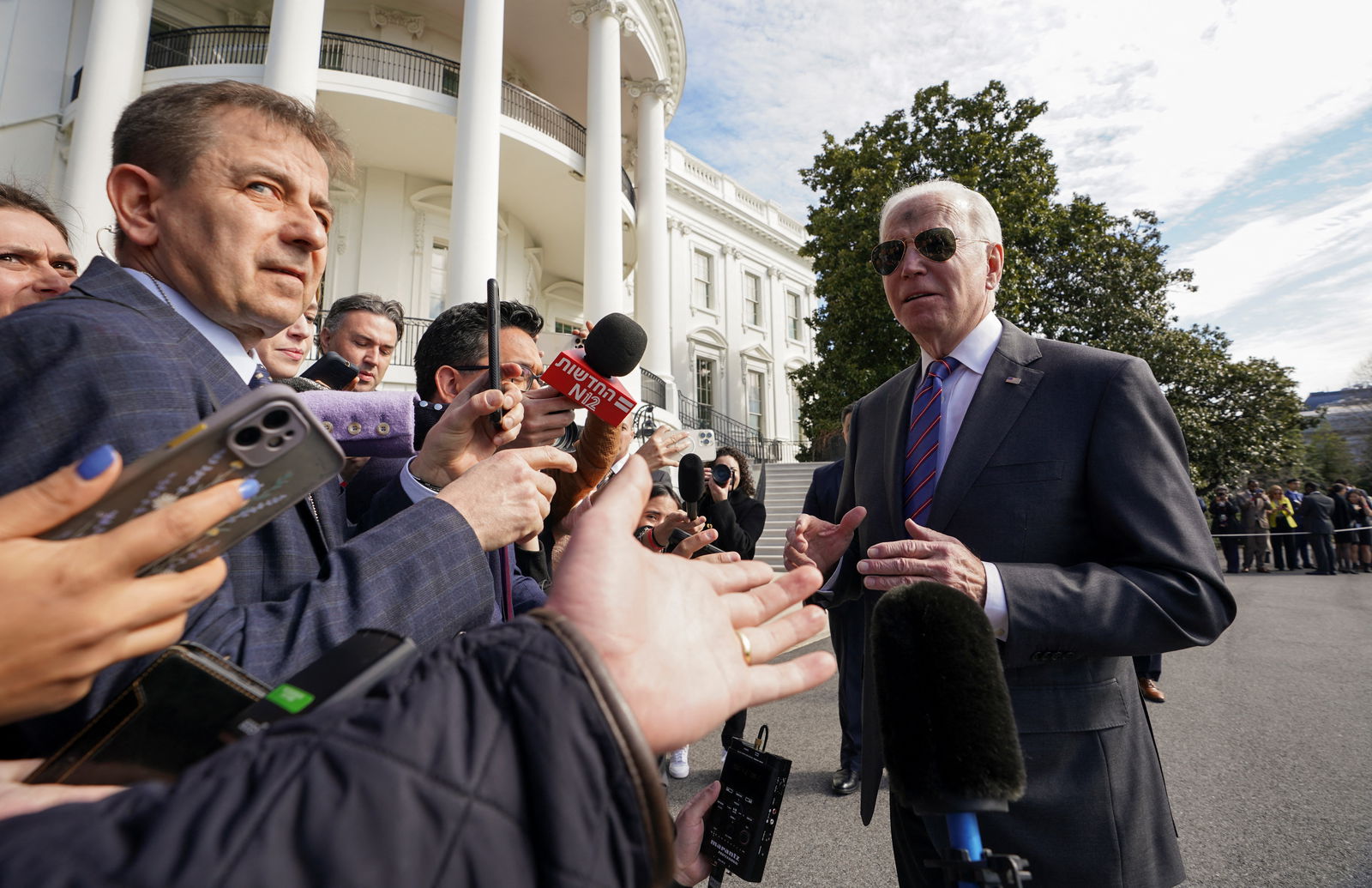 President Joe Biden speaks to reporters upon his departure from the White House on Ash Wednesday, in Washington, D.C., March 2, 2022.