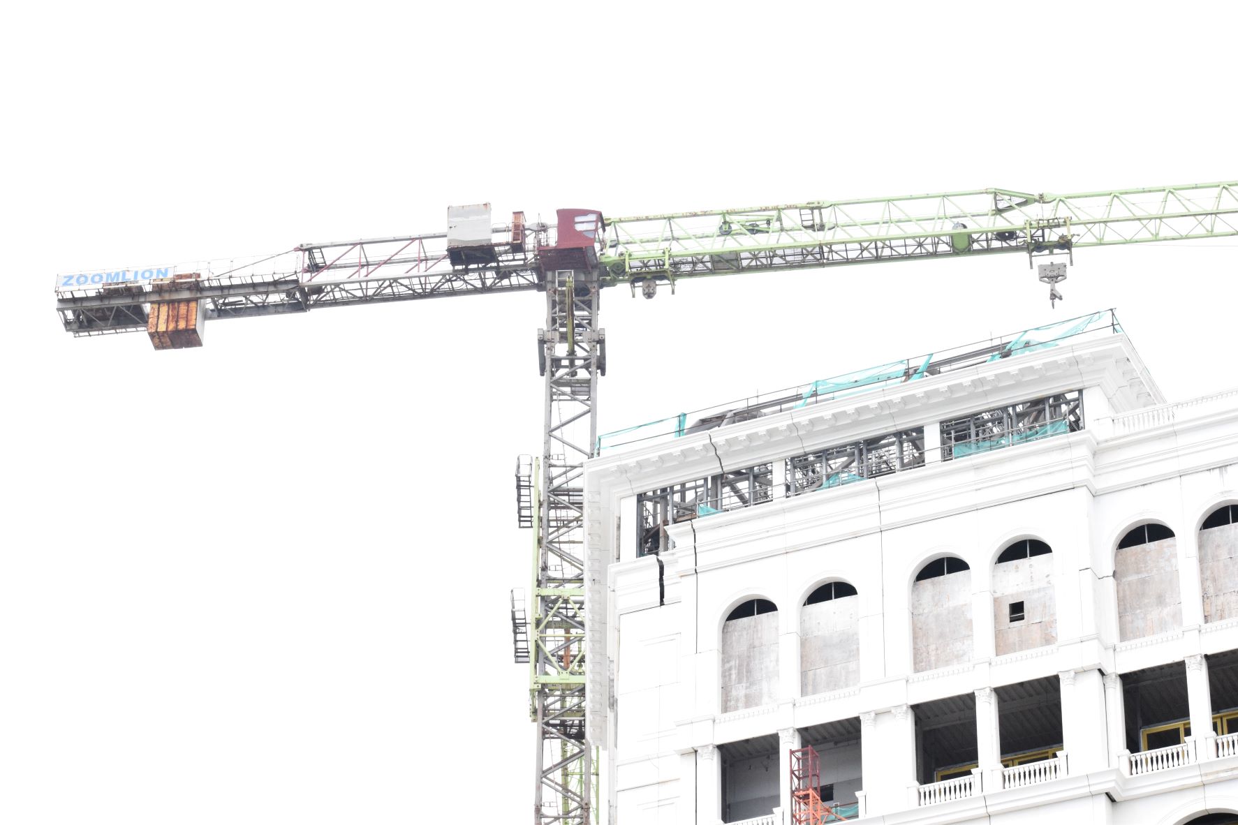 Tower crane No. 5 is being utilized to remove tower crane No. 6 from unfinished Imperial Pacific International casino-hotel in Garapan earlier this month.