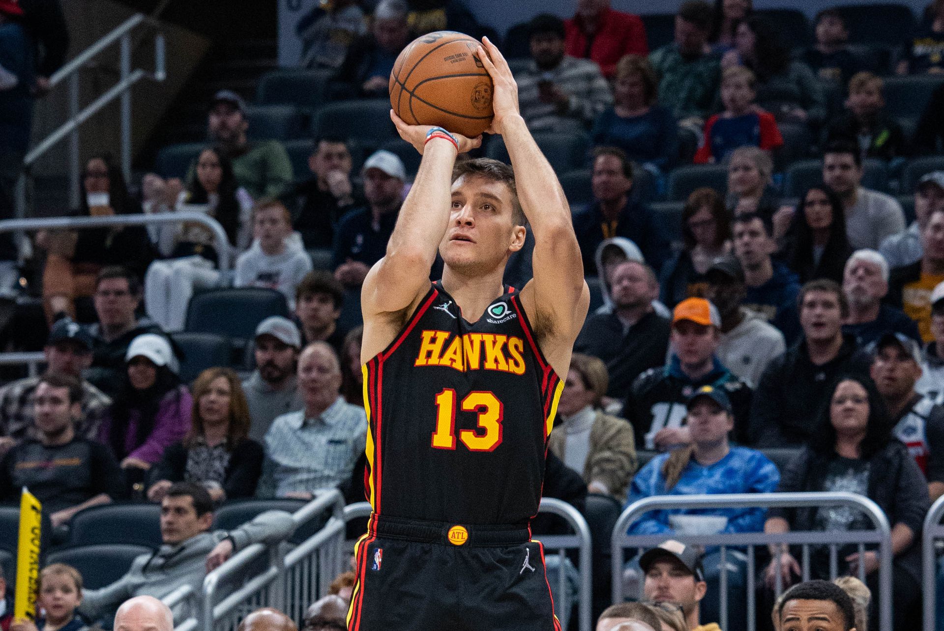 Atlanta Hawks guard Bogdan Bogdanovic (13) shoots the ball in the first half against the Indiana Pacers at Gainbridge Fieldhouse in Indianapolis, Indiana on March 28, 2022.