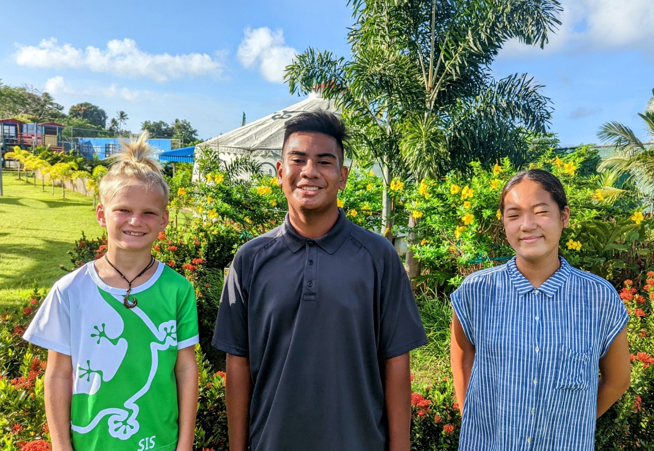 Elementary, middle and high school students of Saipan International School pose for a photo at the SIS back field in front of the garden that the Class of 2020 donated.