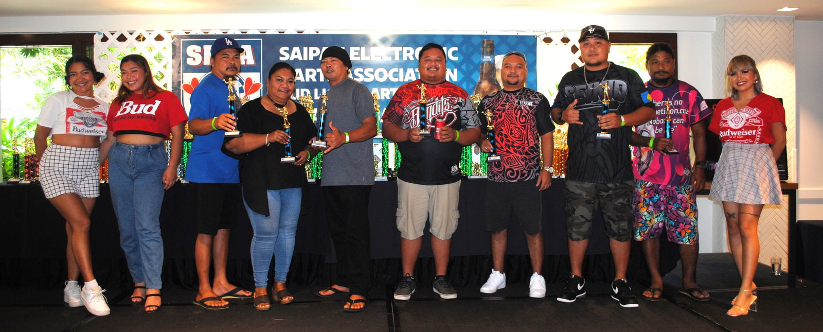 The Hi-Out awardees pose  with the Budweiser models during the SEDA Bud Light League awards banquet Saturday at the PIC.