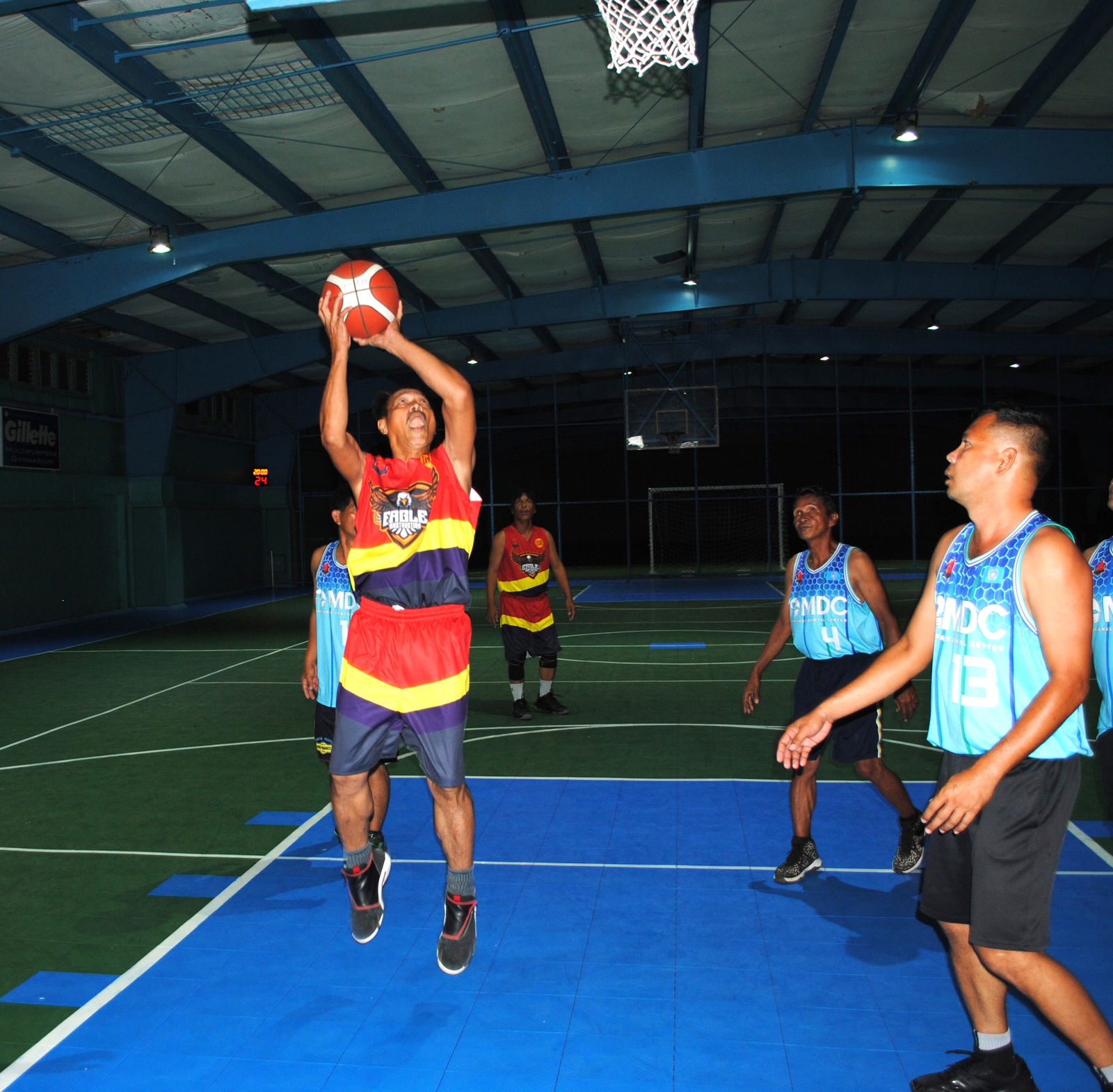 Eagle Construction's Garcia pulls up for the uncontested shot during a master's division game of the Saipan Centennial Lions Club Basketball League at the TSL Sports Complex.