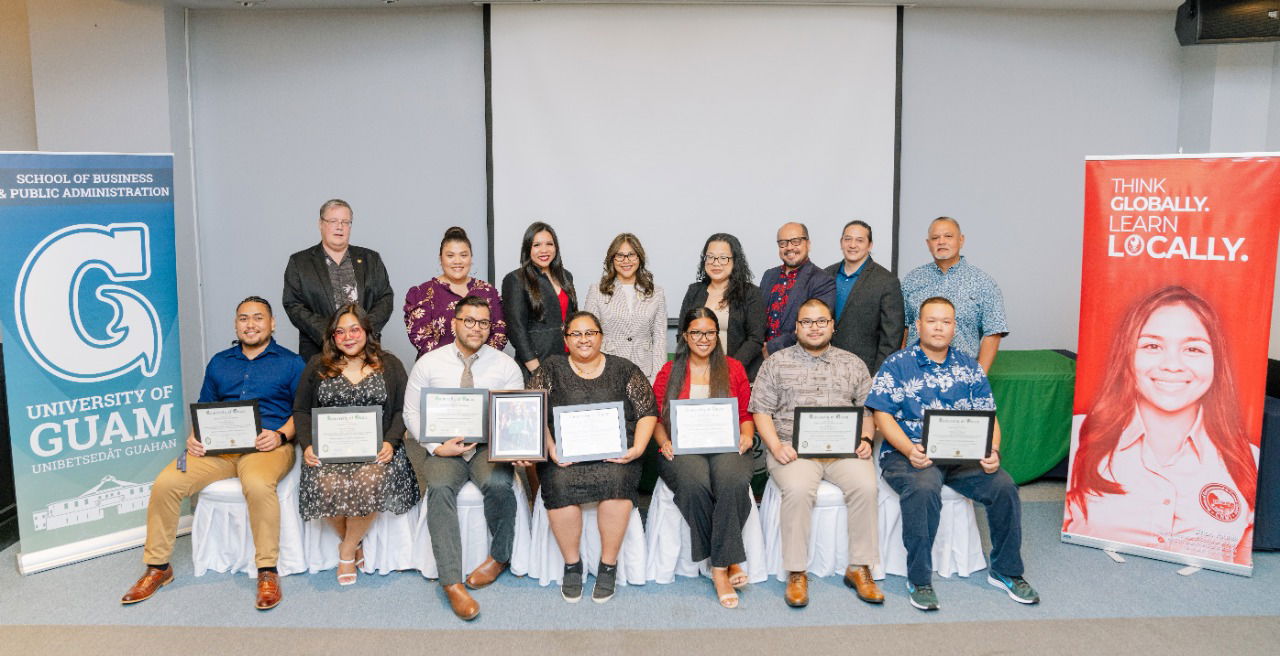 Ten graduates from the University of Guam’s Criminal Justice program hosted through Northern Marianas College received their Latin honor designations at a ceremony on Friday, April 12. In  photo with the honorees are, from left, top row, University of Guam Associate Professor of Public Administration Ronald McNinch-Su, Executive Director Criminal Justice Planning Agency Zerlyn Taimanao, UOG Associate Director of Global Learning and Engagement Amanda Blas, Dean of UOG’s School of Business and Public Administration Annete Santos, Northern Marianas College Regent Zenie Mafnas, NMC President Galvin Deleon Guerrero, UOG Associate Professor of Public Administration John Rivera, and UOG Director for Global Learning and Engagement Carlos Taitano.