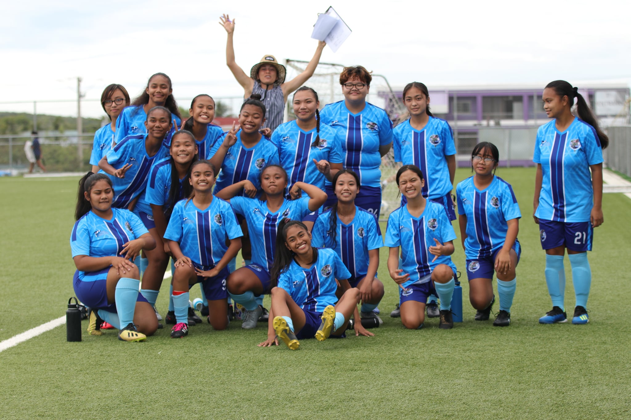 Marianas High School's footballers pose for a photo at the NMI Soccer Training Center.