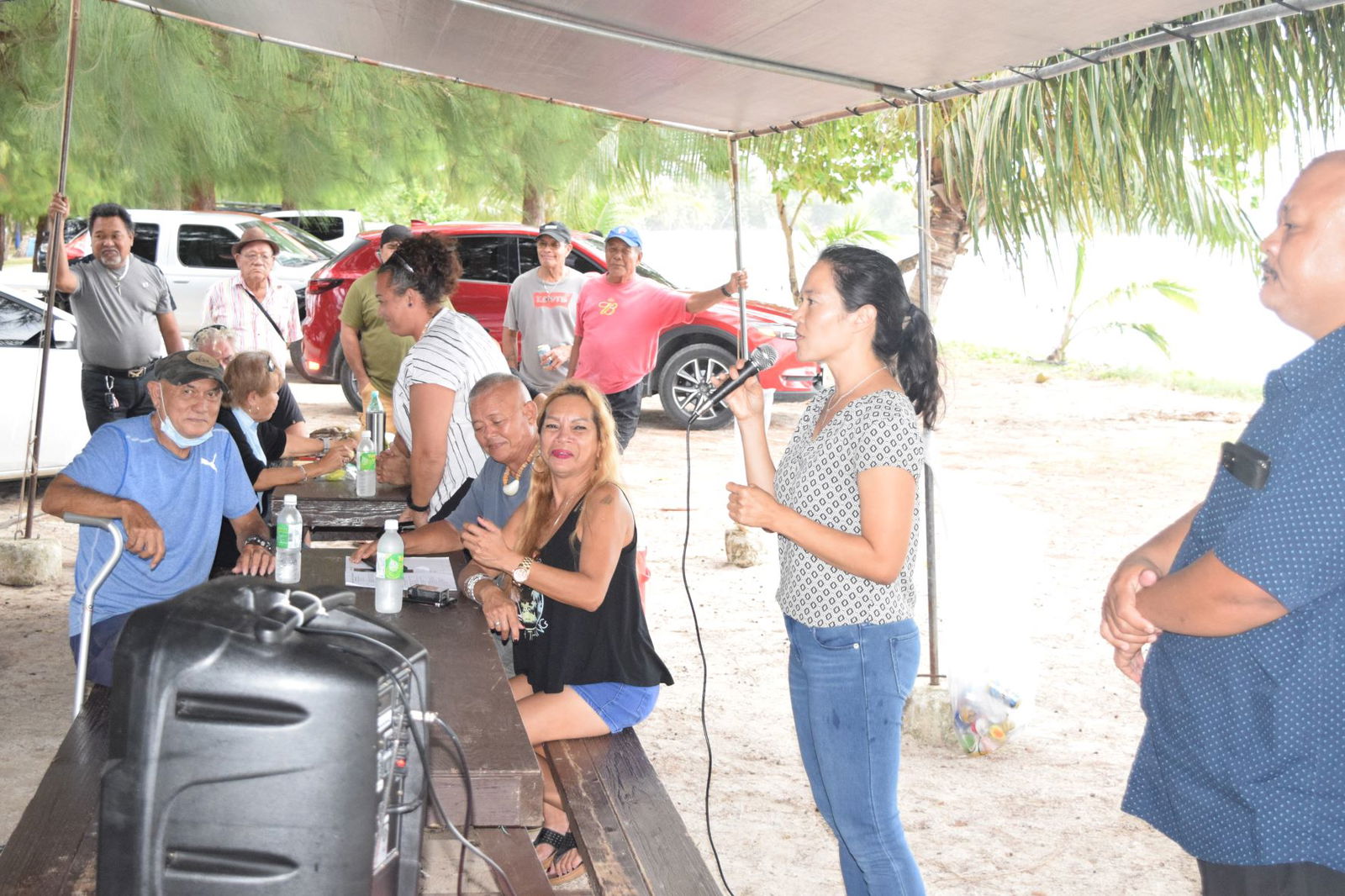 Rep. Tina Sablan speaks as Rep. John Paul Sablan and officers of the Bantalan Sugar Dock Inc. listen during a meeting in Chalan Kanoa on Wednesday.