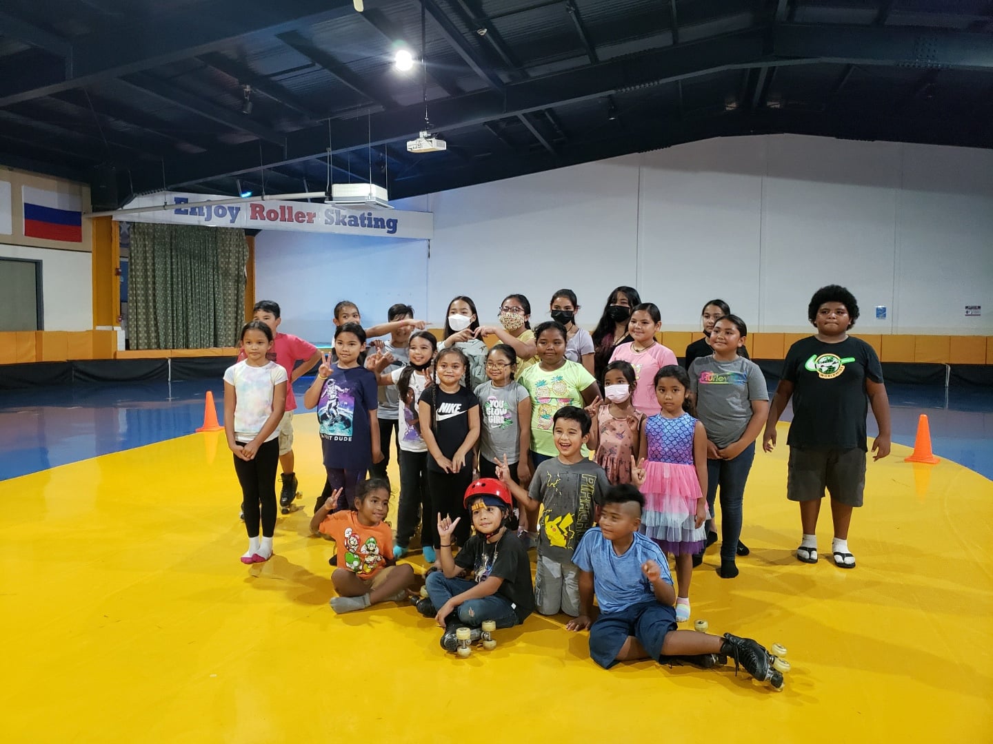 Children pose for photo at P&A Corp.'s skating rink.